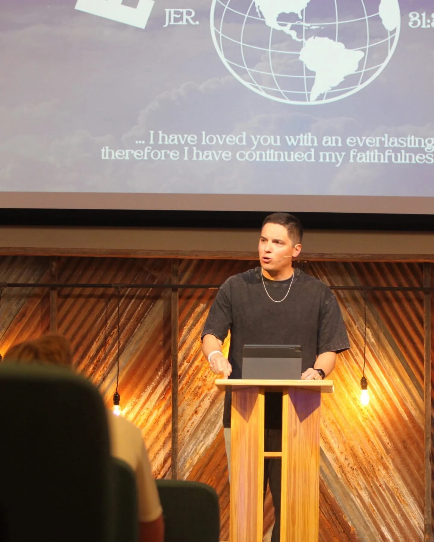 Daniel Villarreal preaching at a church service in Central Texas