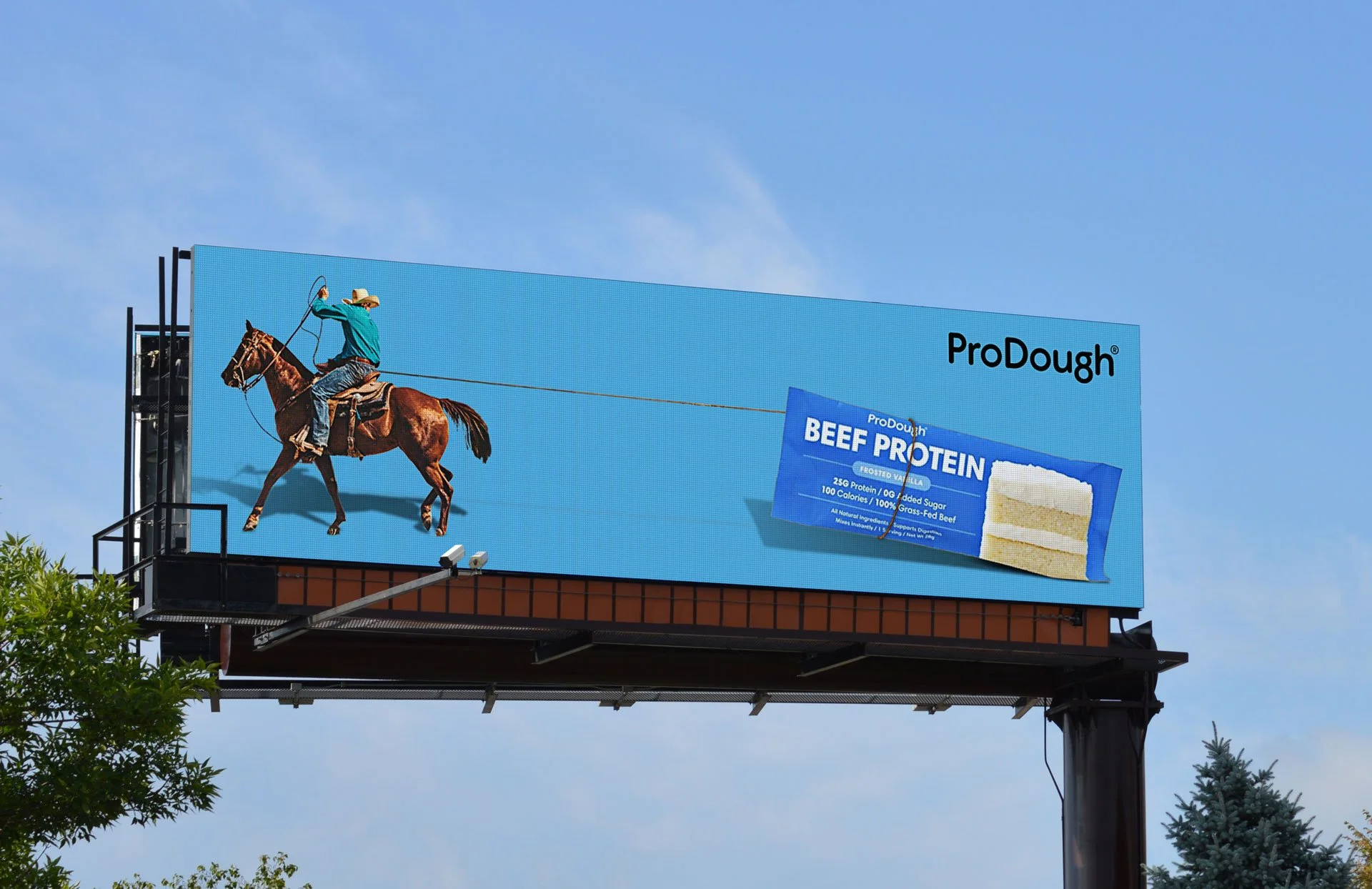 Cowboy on horseback lassoing a ProDough Beef Protein packet on a blue digital billboard
