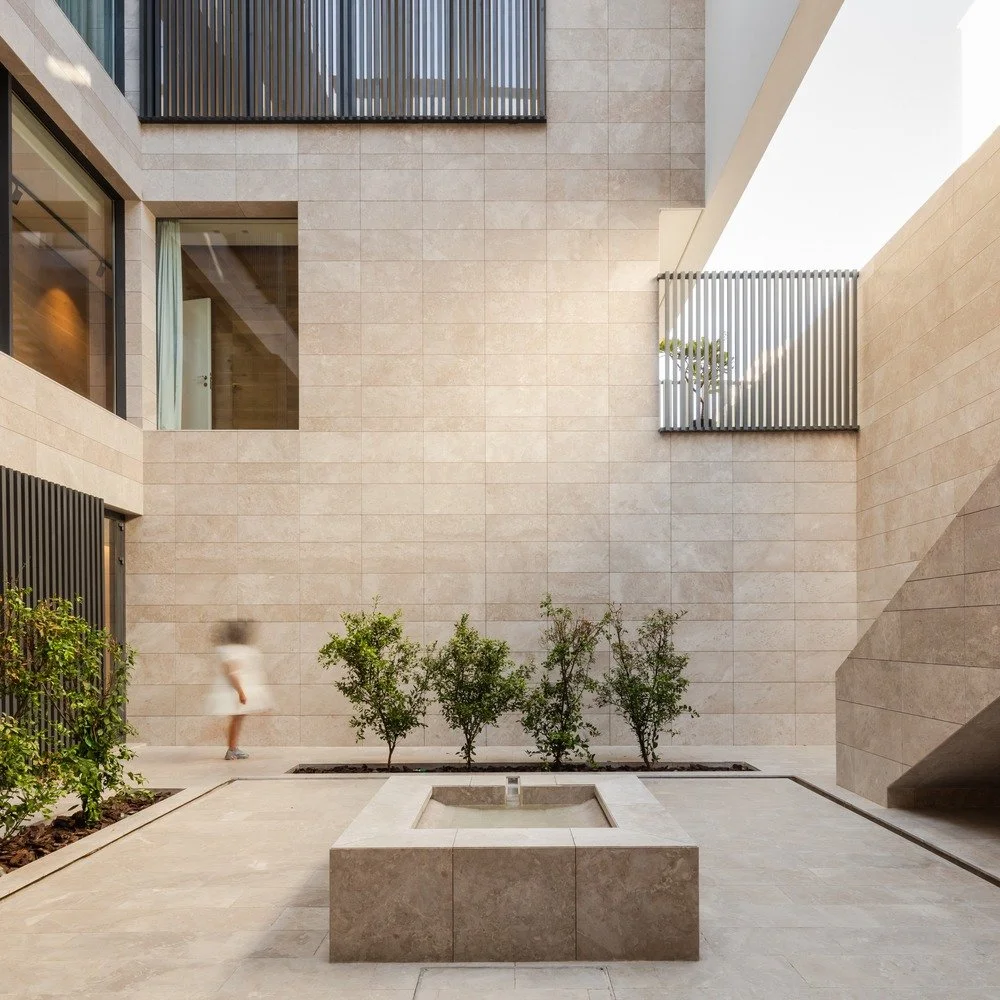 An architectural marvel in the heart of Mishref! Thoughtfully designed to balance privacy and openness, this serene retreat beautifully reflects the unique lifestyles of two families. The clean, monolithic white fa&ccedil;ade rests gracefully on a st