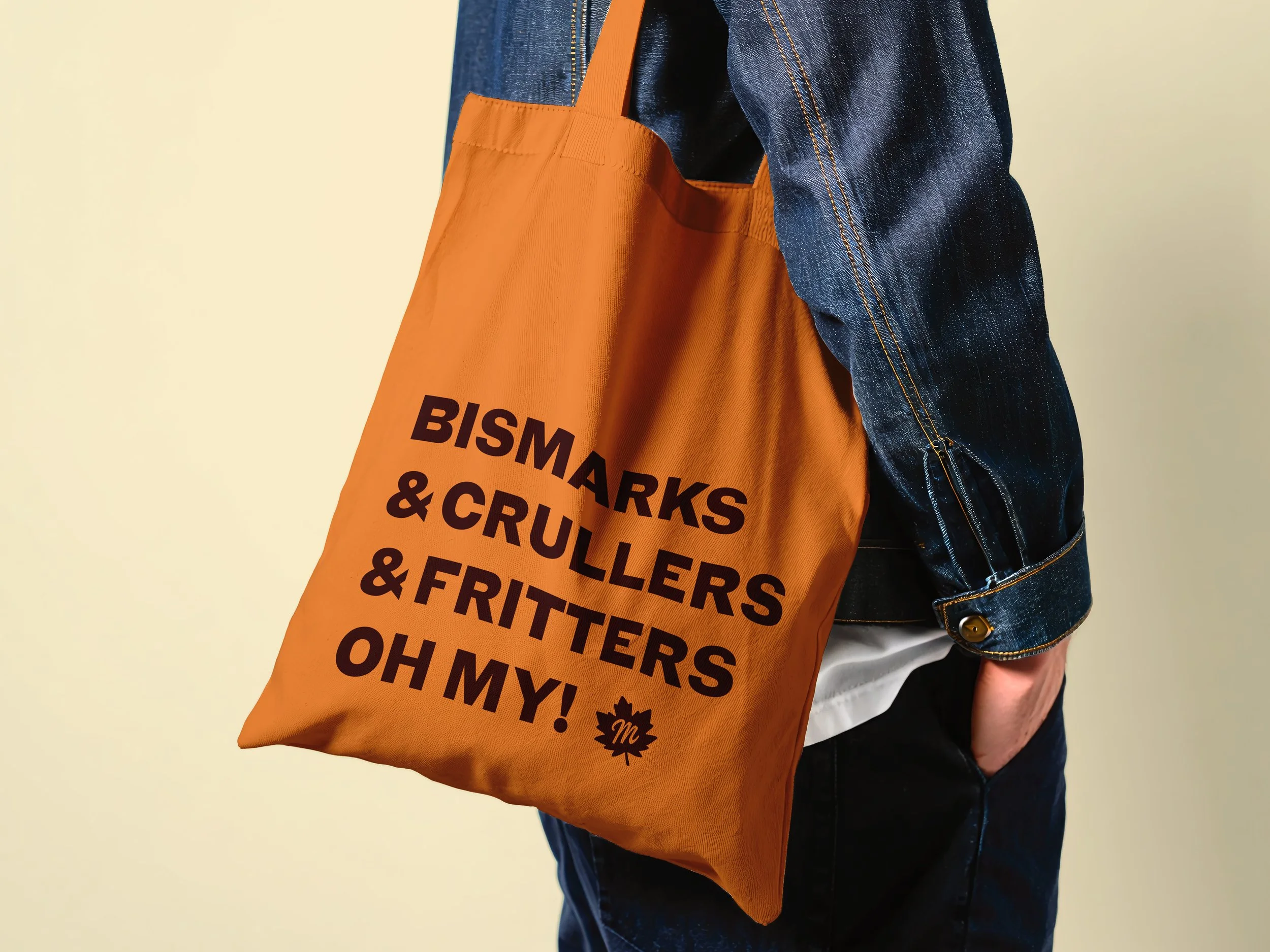 Branded Maple Donuts orange tote with brown text