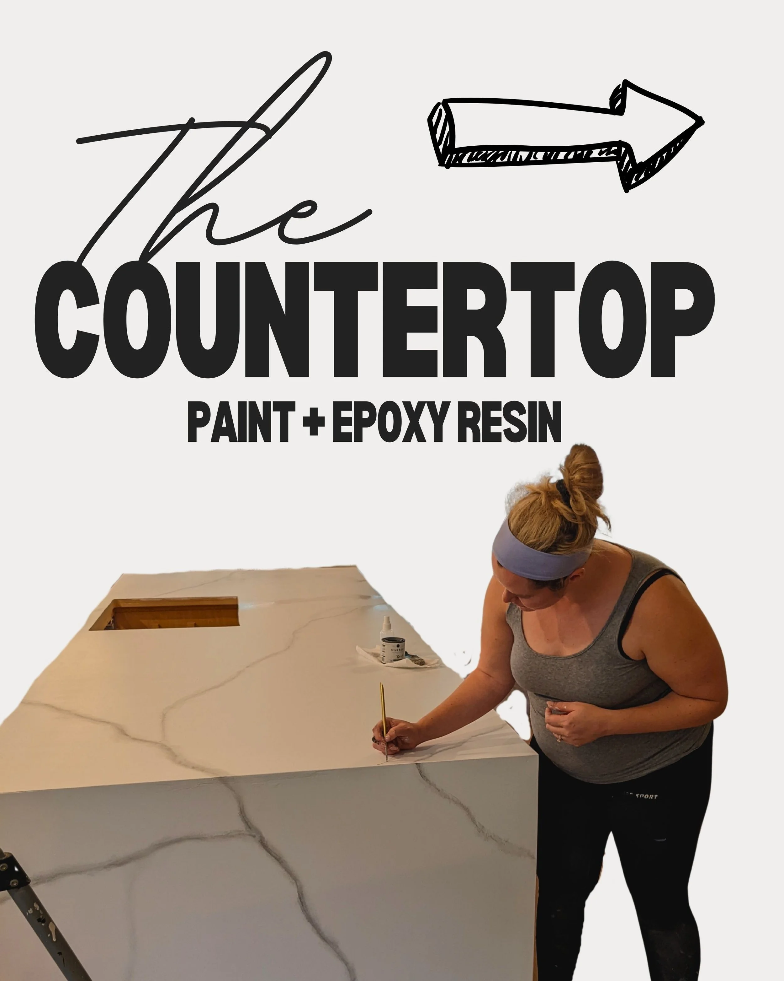 A woman in workout clothes is painting a large white quartz countertop with gray veining, with painting supplies nearby.
