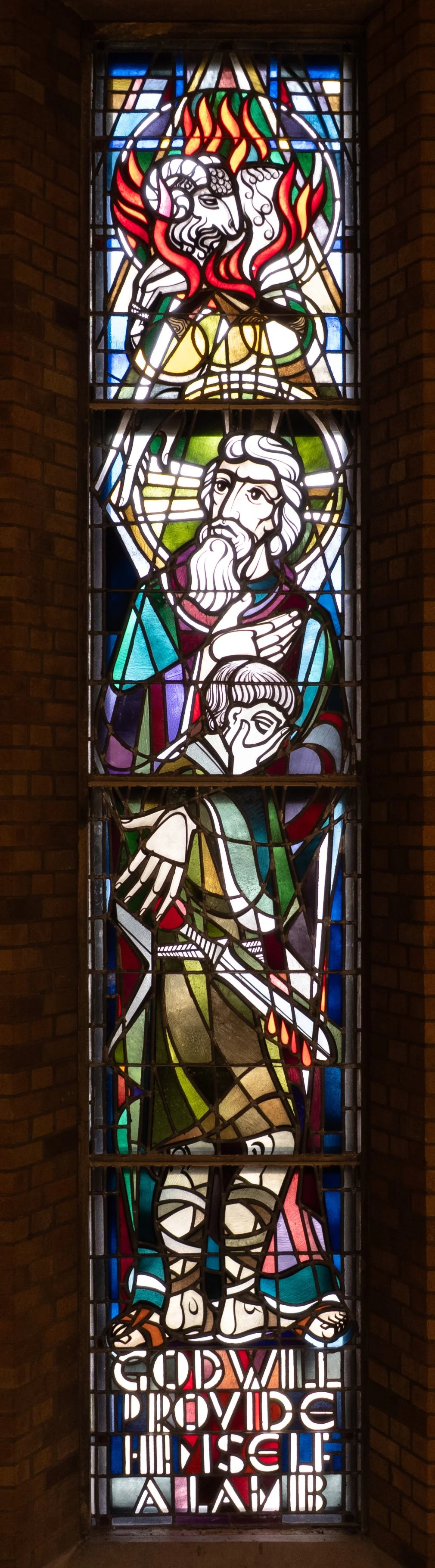 A stained glass window depicting biblical figures, including a lion at the top, God, and a person holding a torch, with the text 'GOD WILL PROVIDE HIMSELF A LAMB' at the bottom.