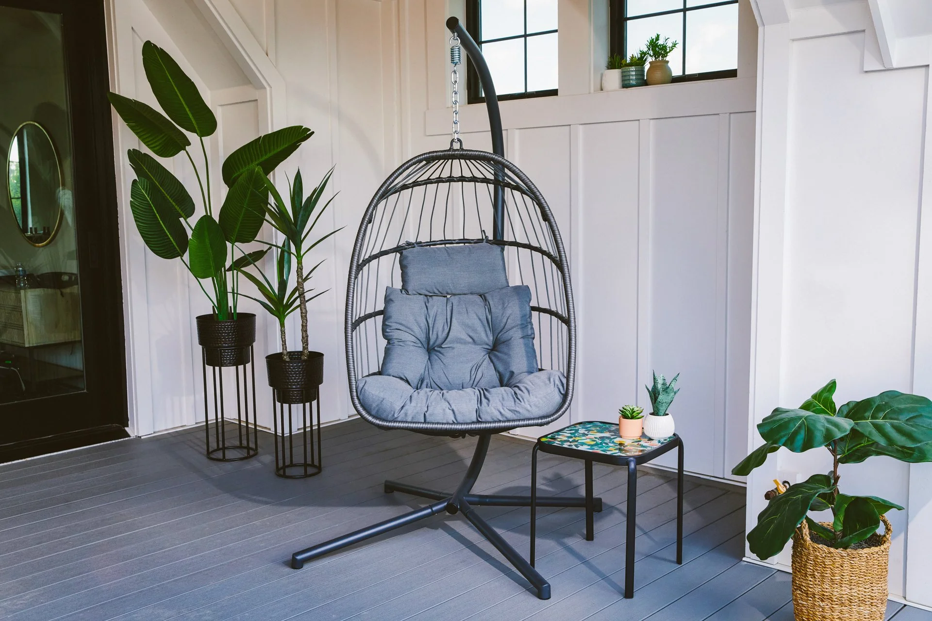 NicoleMiller_SteelRopeHangingChair_WingbackWickerChairPatternstackingsidetables_0429-B0-1009_web.jpg