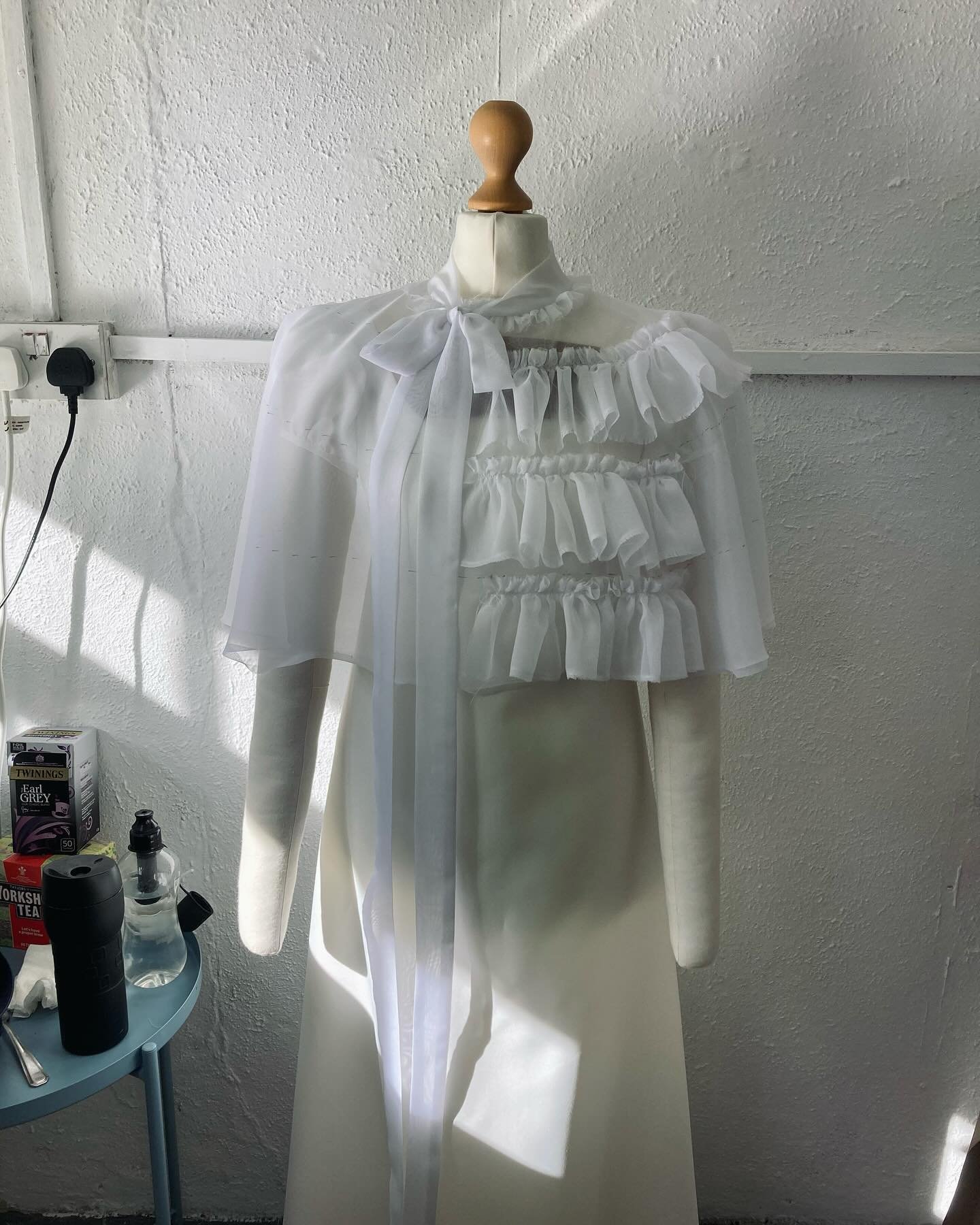 A toile made for Hyacinth Bridgerton for a beautiful ombr&eacute; frilly cape, seen for a few seconds at the balloon race in series 3. This one drafted by our own @annprescott01 💗 No need to put frills all the way around the toile but we try them ou