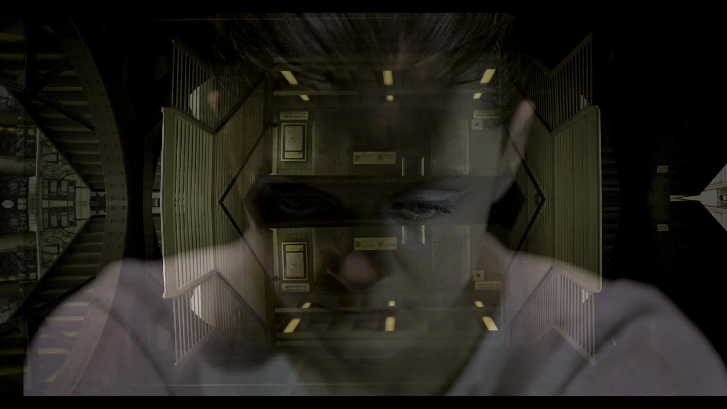 A reflection of a person's face with closed eyes is superimposed over an indoor stairwell with railings and walls, creating a layered, surreal visual effect.