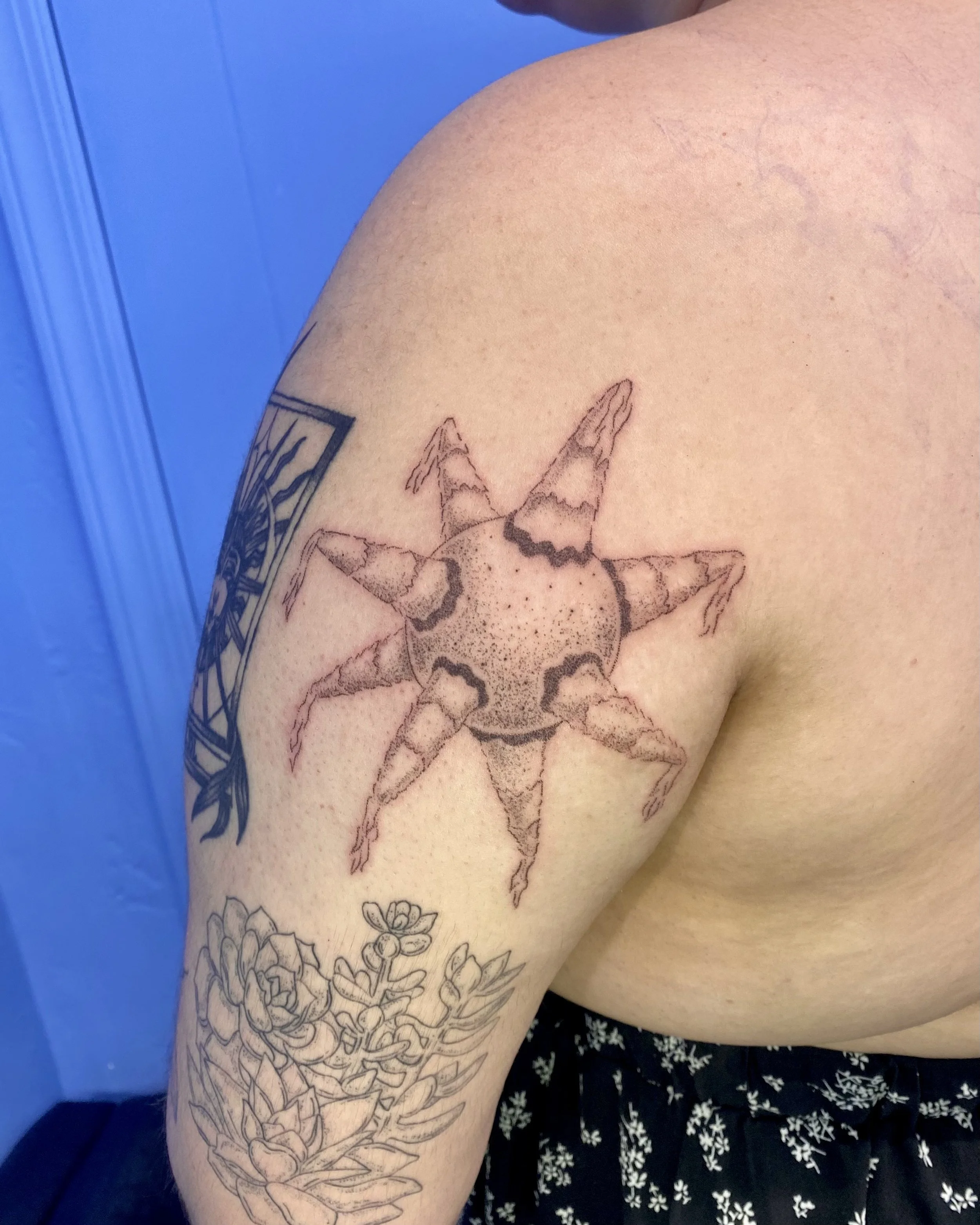 tattoo of a piñata