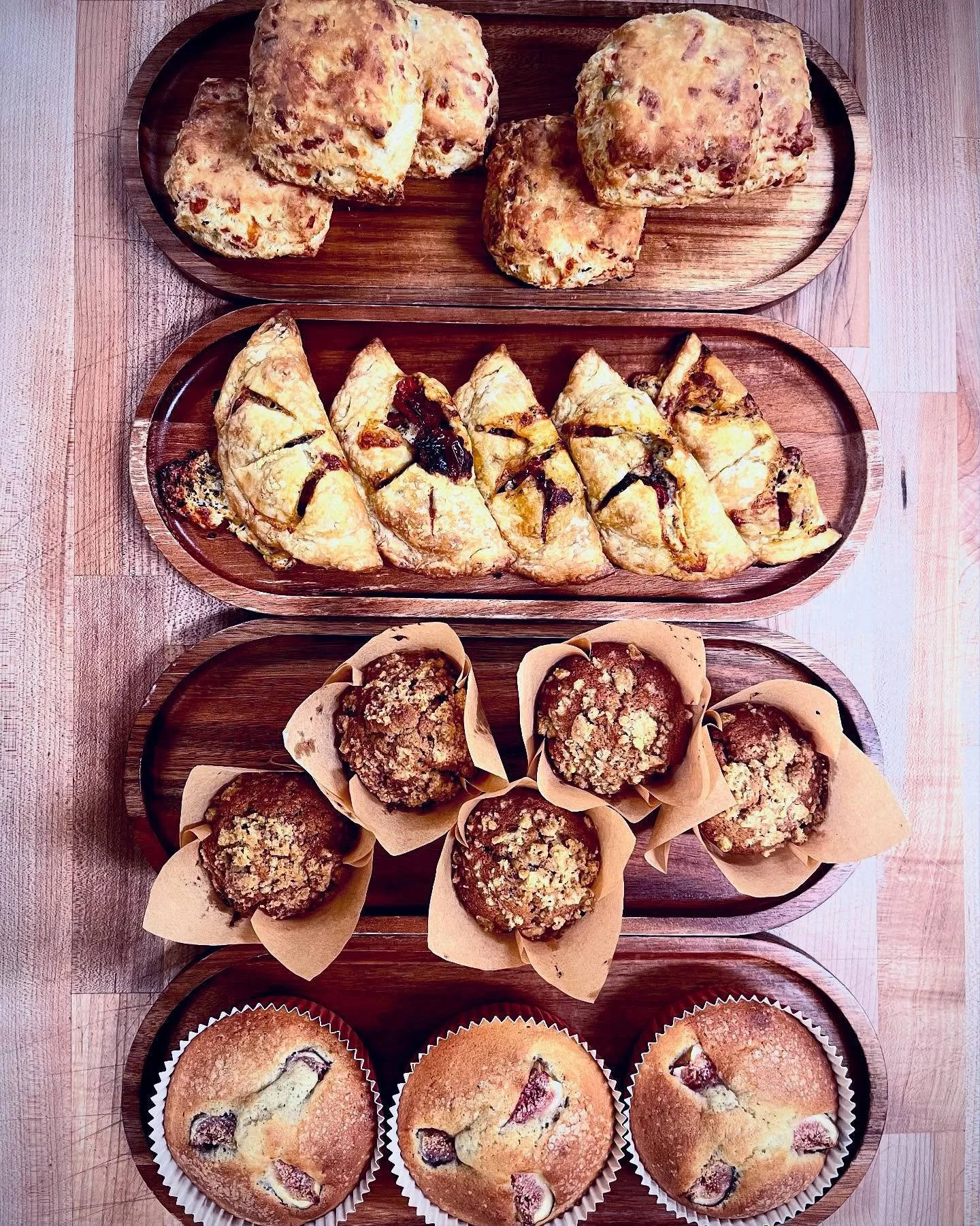 Top to bottom:
- white cheddar and chive biscuits
- caprese hand pies
- carrot muffins with pistachio crumble
- fresh fig cakes

Also available today:
Almond croissant scones, cinnamon rolls, black sesame shortbread, rye oatmeal raisin cookies, brown