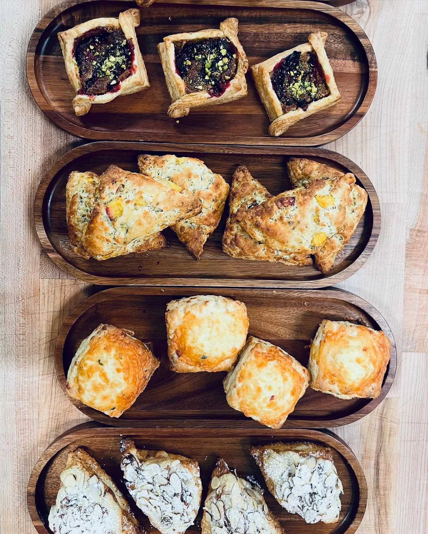 Top to bottom:
- Pistachio Plum Danishes
- Peach, Pistachio &amp; Pink Peppercorn Scones
- Pepper Jack Biscuits
- Almond Croissant Scones

Just a few of the items we have available today! Here until 2!

#bakedfreshdaily #bakery #asheville #ashevilleb