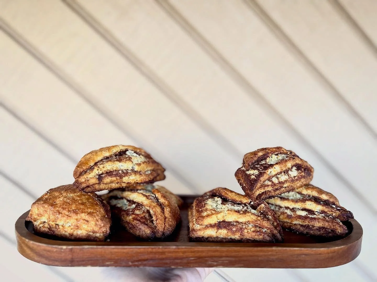 Cinnamon sugar scones are back! Much-loved and often-requested, these tender layers of gently sweetened scone filled with cinnamon & sugar are the perfect way to start your day! Available daily for the foreseeable future. 
#bakery #asheville #as