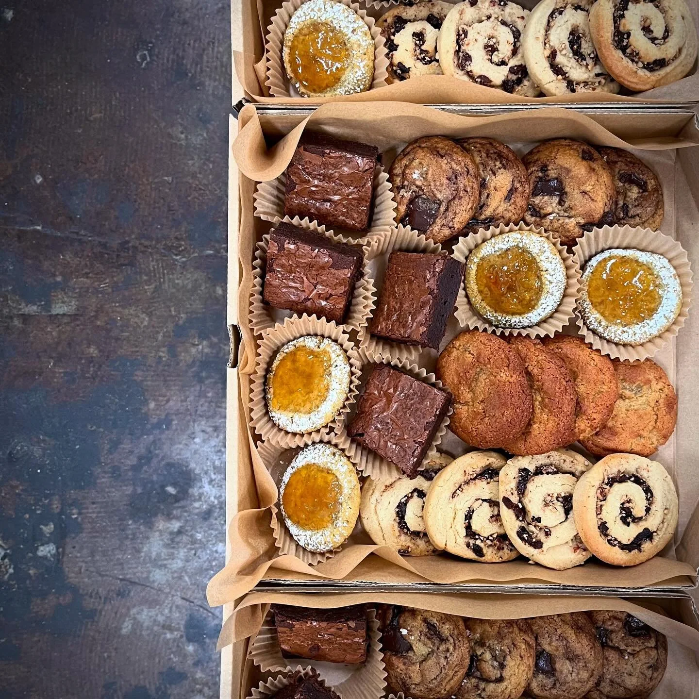 It&rsquo;s time for holiday cookie boxes again!!! The photo is of last year&rsquo;s offerings, but this year&rsquo;s are similar and will include:

- brown butter chocolate chunk cookies
- frangipane cookies
- brownies
- rosemary pinwheels with cherr