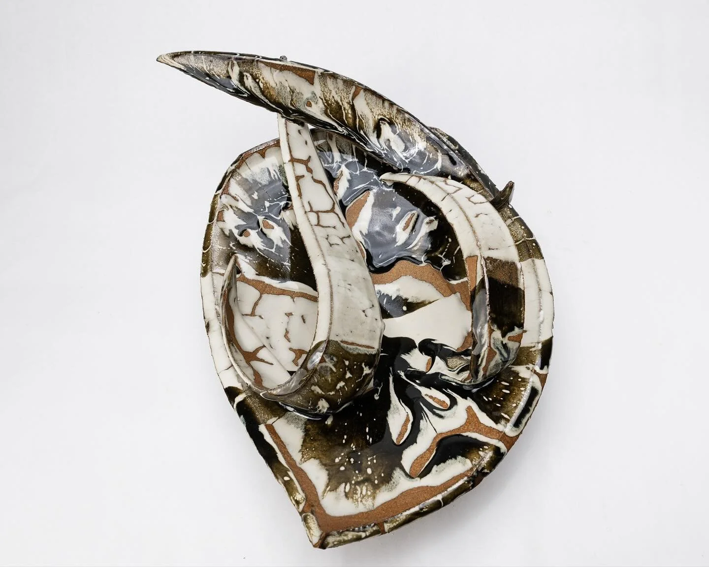 Thrown, deconstructed, reconstructed platter 

#ceramics #ceramic #ceramicartist #glaze #glazed #glazes #potter #pottery #potterygram #potterylife #ceramicsculpture #clay #uiowa #uiowaart