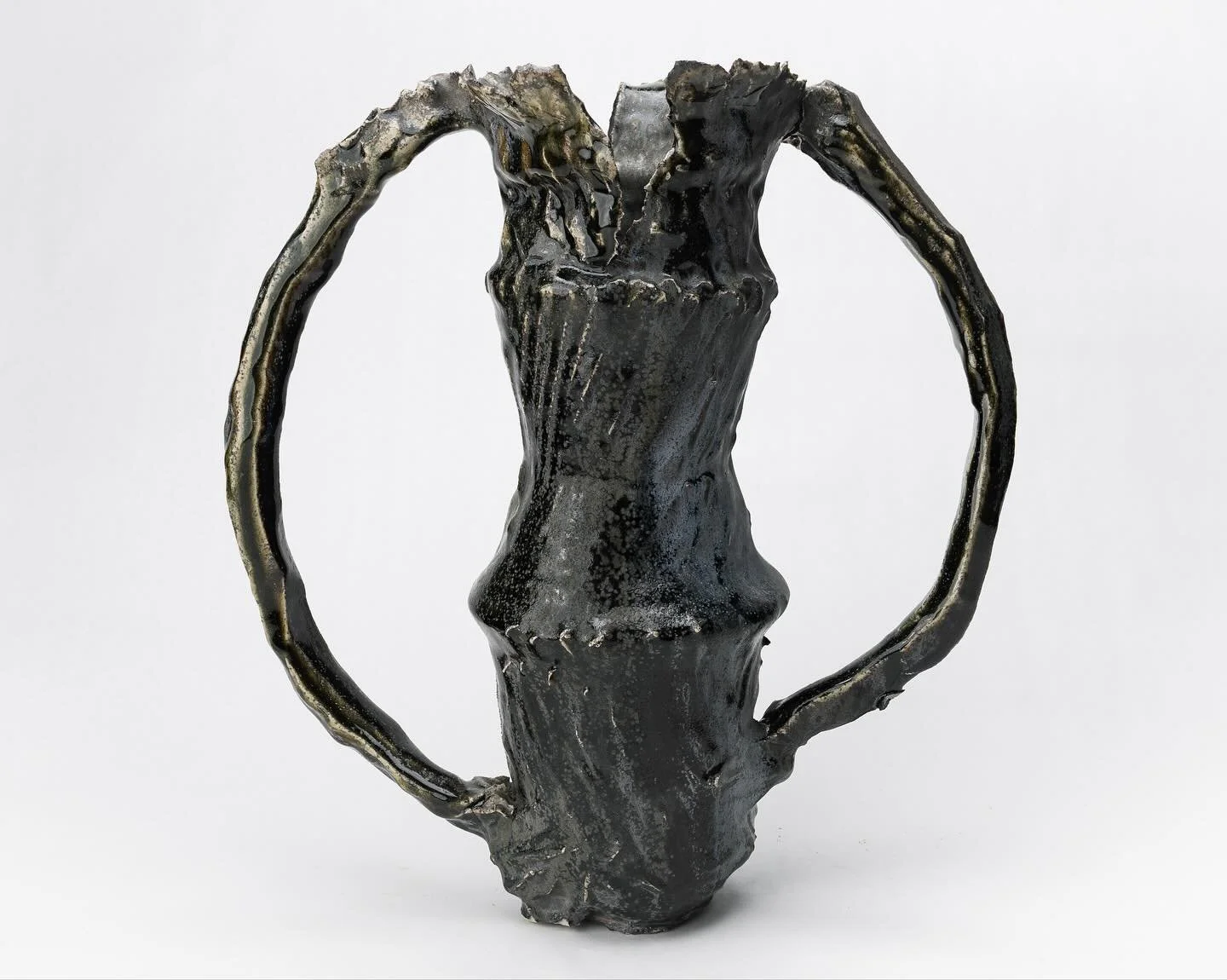 Fitting time of year for posting this vessel. Thrown, glazed with wood fire glaze recipe I was trying out, and then wood-fired. 

#ceramics #ceramicsofinstagram #ceramicart #ceramicartist #clay #clayart #glaze #glazes #halloween #spookypottery