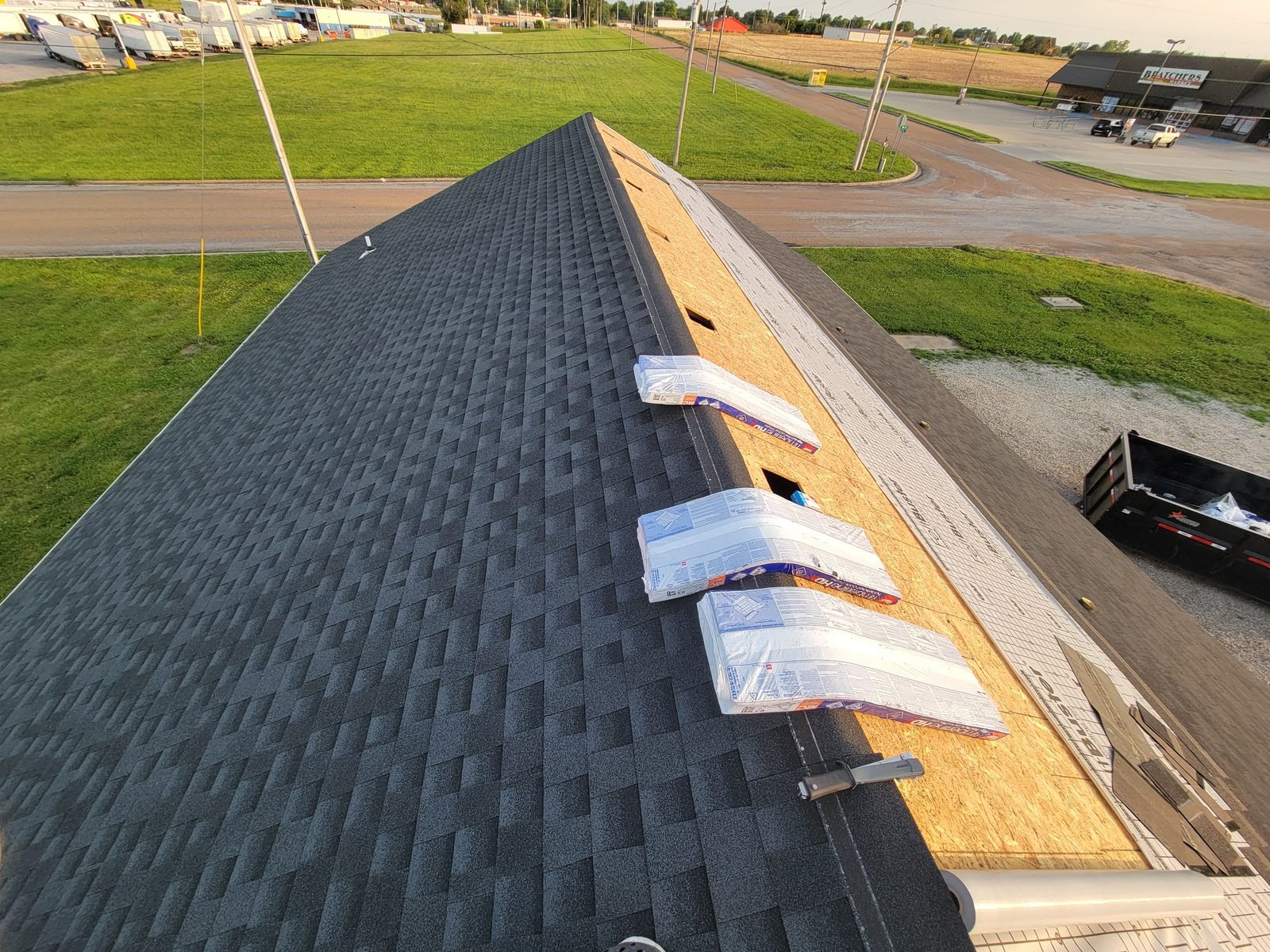 Shingle bundles staged on the roof during installation