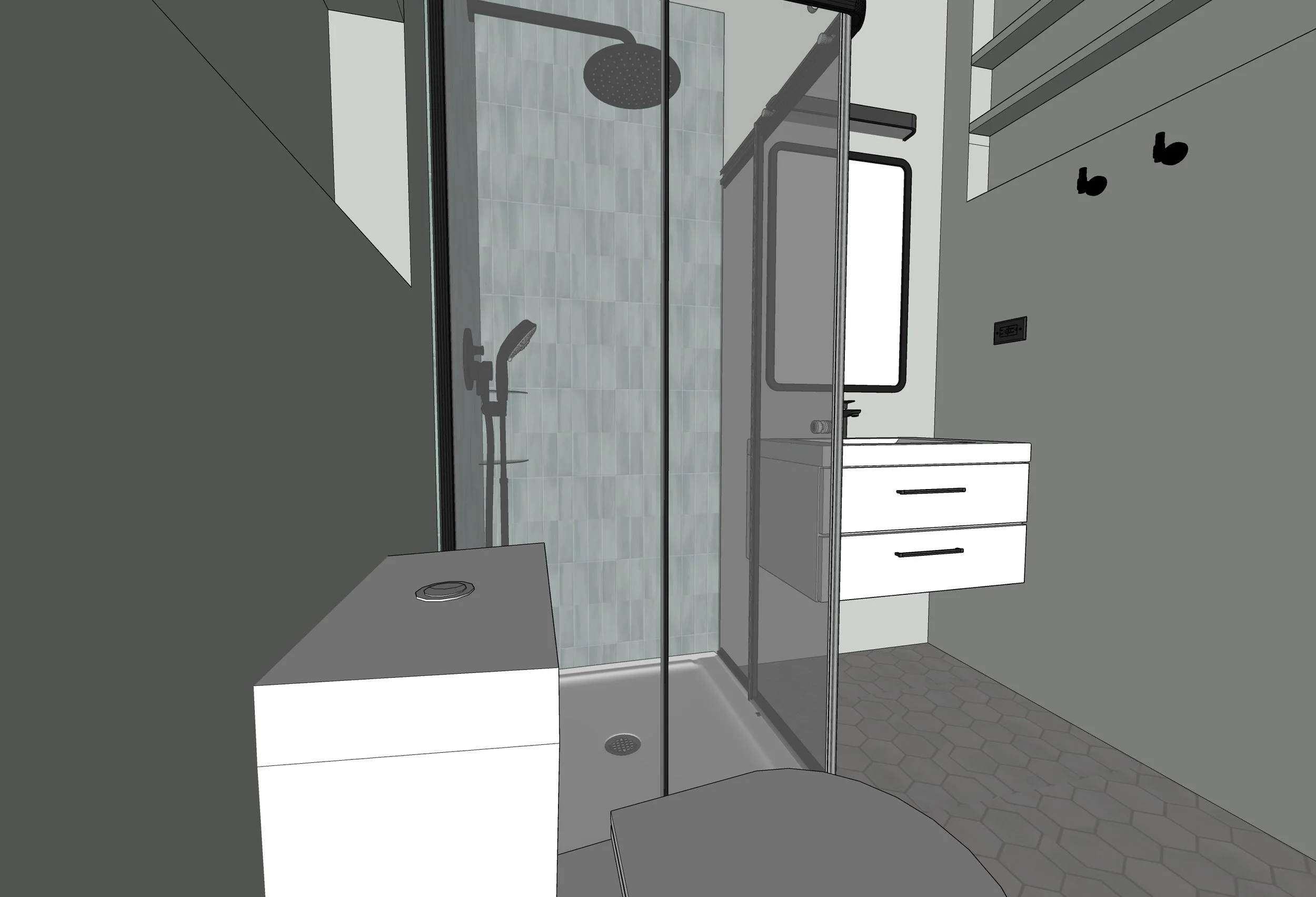 Bathroom interior with a walk-in shower, glass doors, a black rainfall showerhead, a handheld shower, a white vanity with black handles, grey cabinets, and grey hexagonal floor tiles.