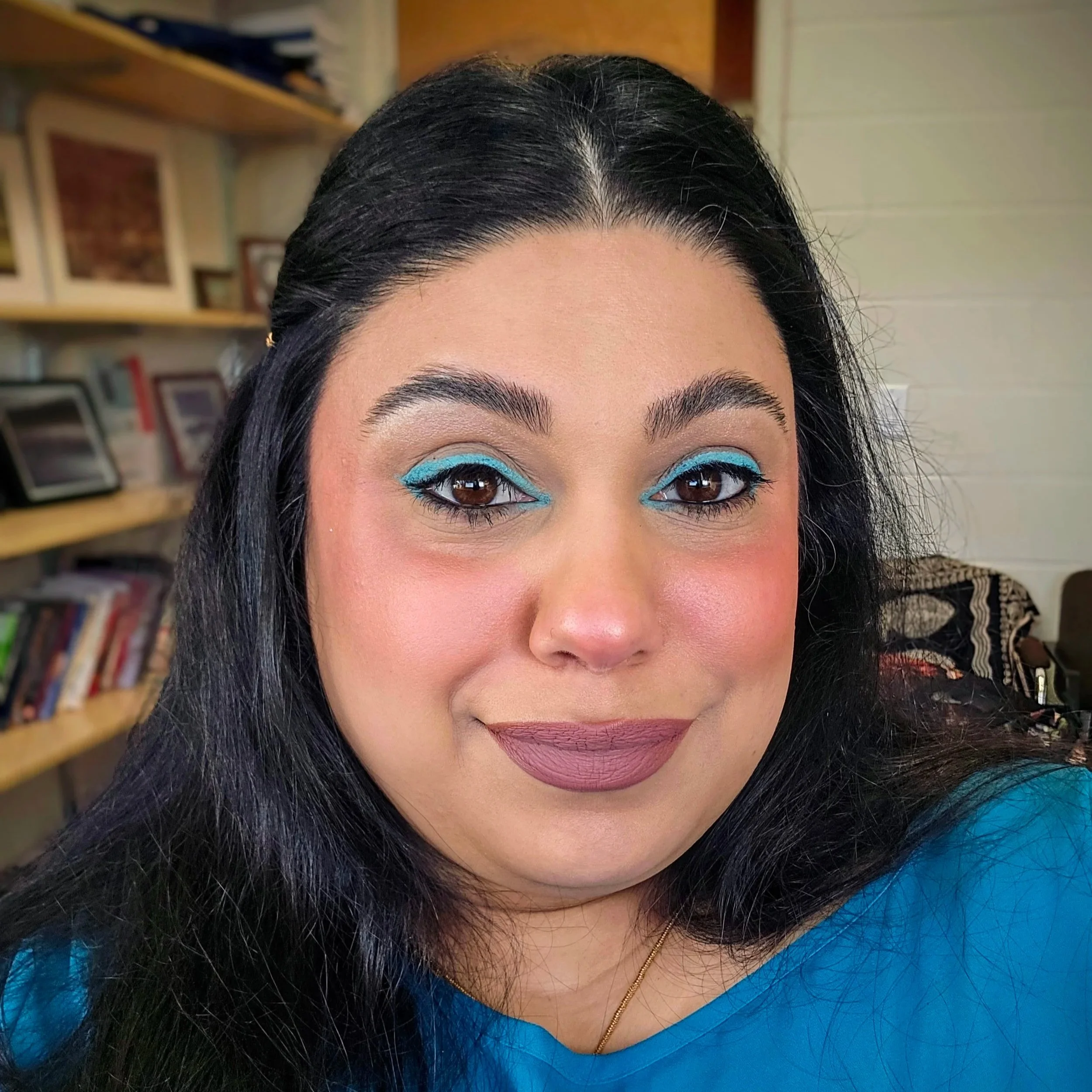 A headshot photo of Ramanpreet Annie Bahra.