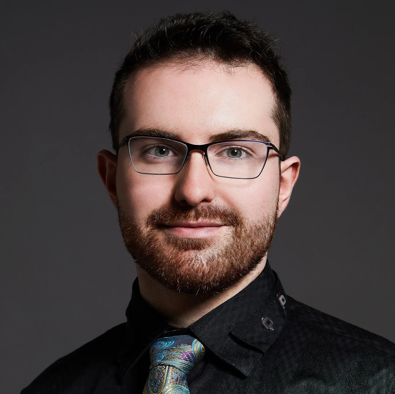 A headshot photo of Johnathan Clancy.