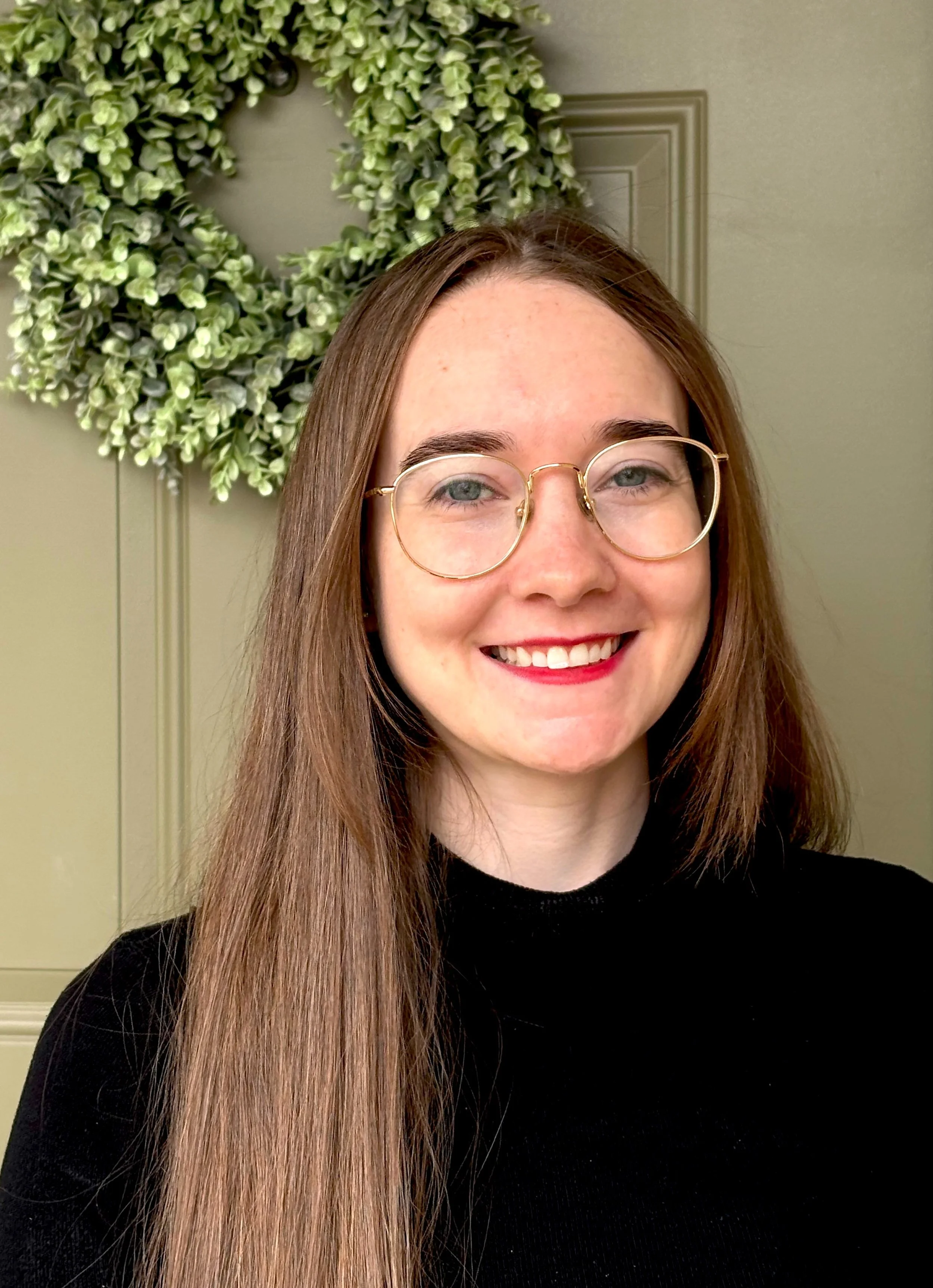 A headshot photo of Hannah Maitland.