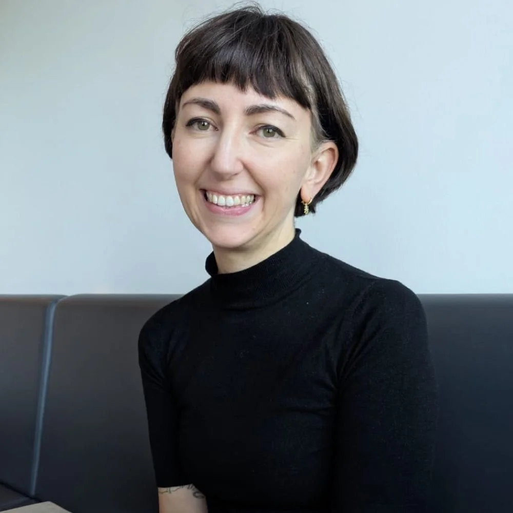 A headshot photo of Hannah McCann.