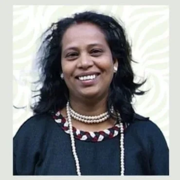 A headshot photo of Minakshi Das.