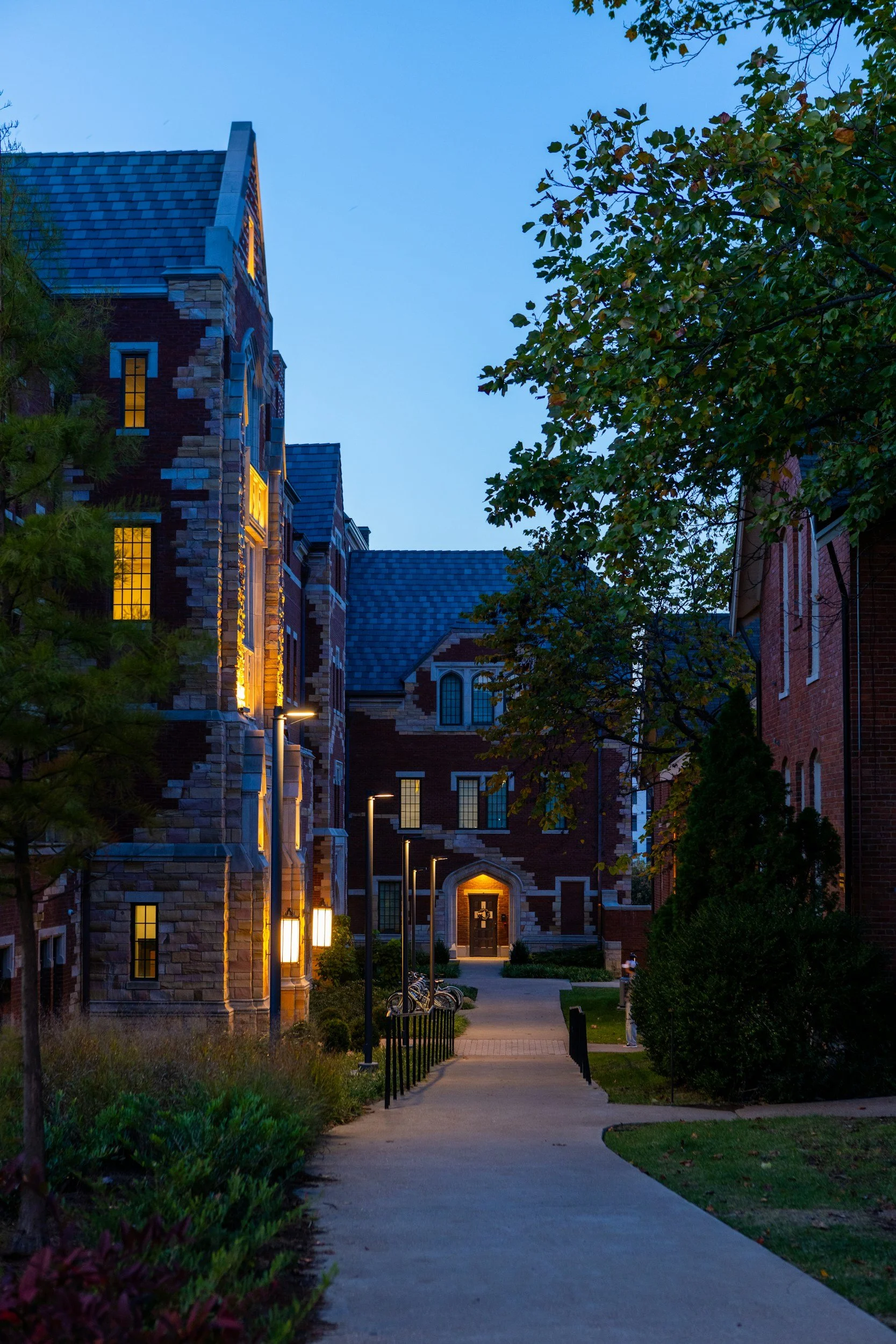 College campus buildings in the evening during a busy academic semester.