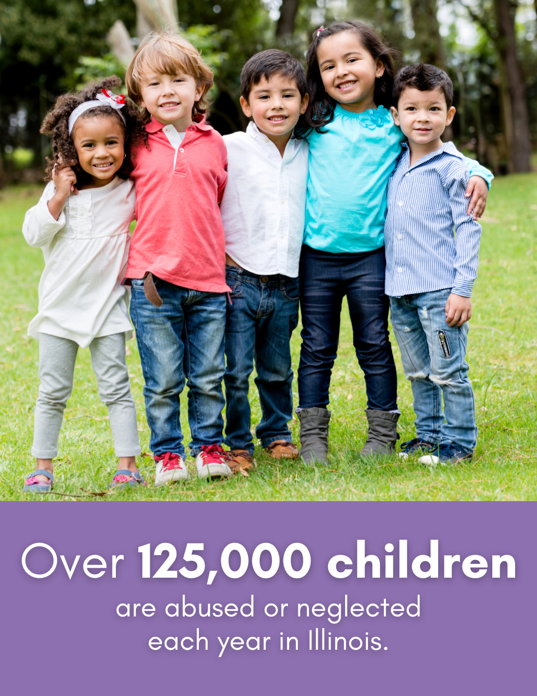 Group of five diverse children standing outdoors on grass, smiling.