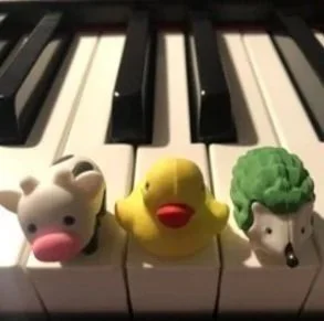 3 coloured animal figurines on keys