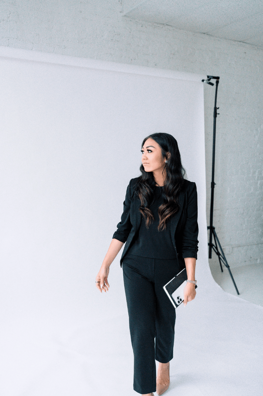 Luxury event planner and founder of Gian Events in a modern studio brand portrait