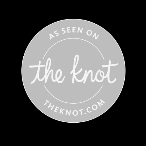 A circular logo with a light gray background and white text that reads 'As seen on the knot' and 'theknot.com' around the edges.