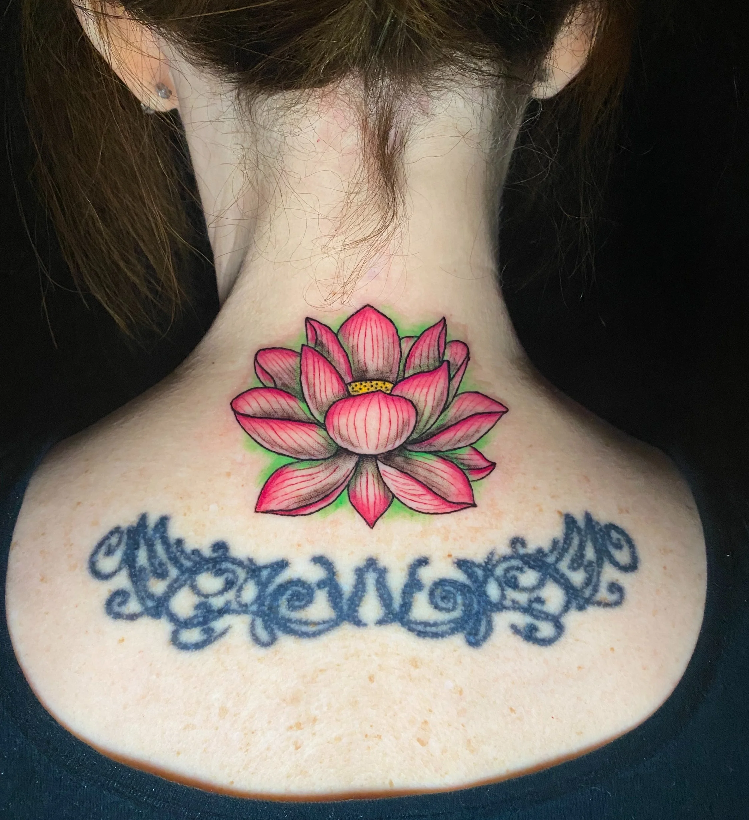 Really proud of this one! Had a blast with the color combo on this lotus. 💖  Bottom tattoo by another artist.  They look nice together!