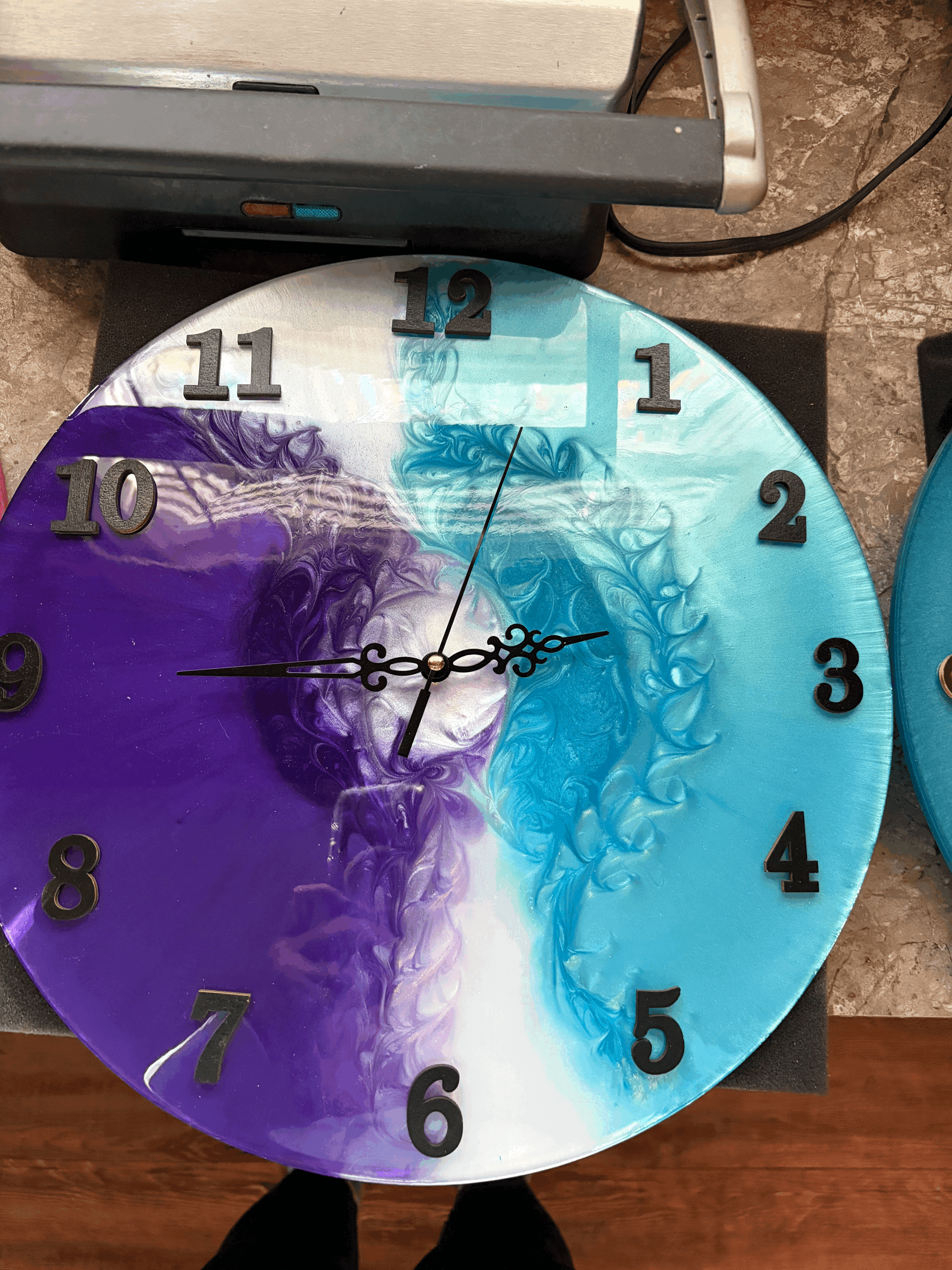 Purple, white and turquoise clock