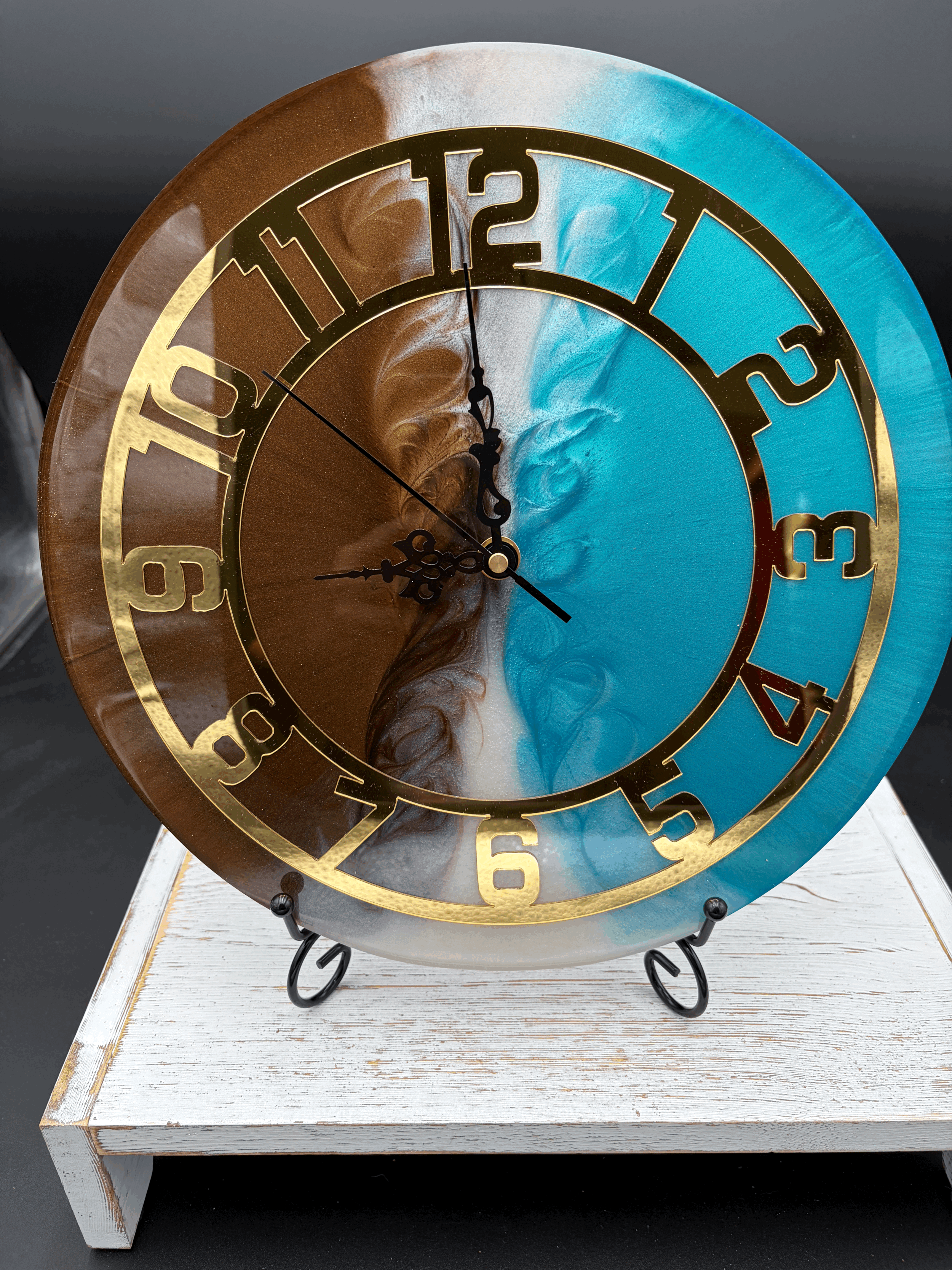 Turquoise and brown clock with gold face