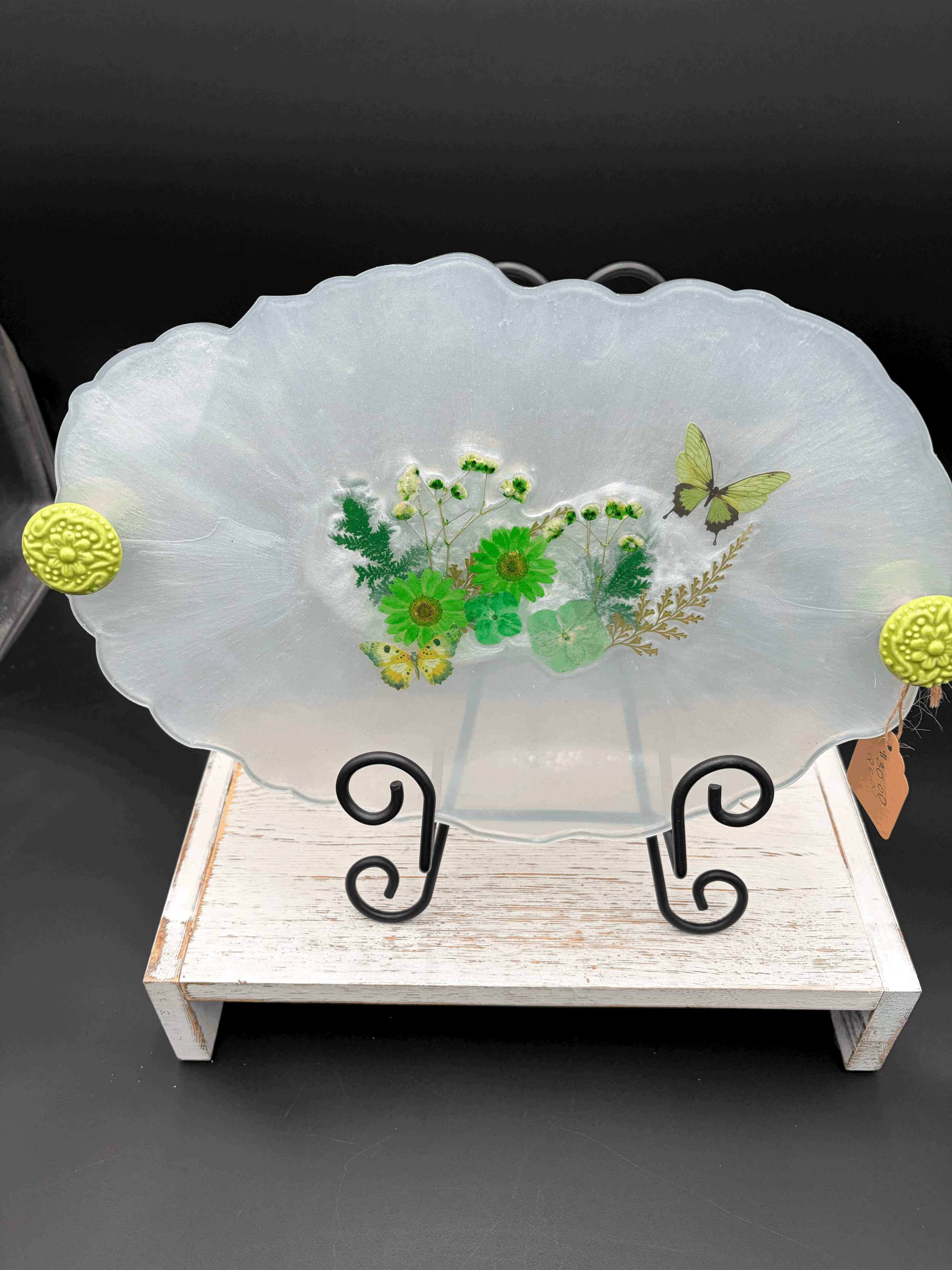 White serving try with flowers and butterflies.