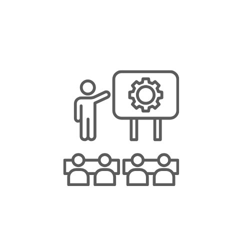 A person giving a presentation in front of an audience, with a presentation board displaying a gear icon teaching leadership management training.