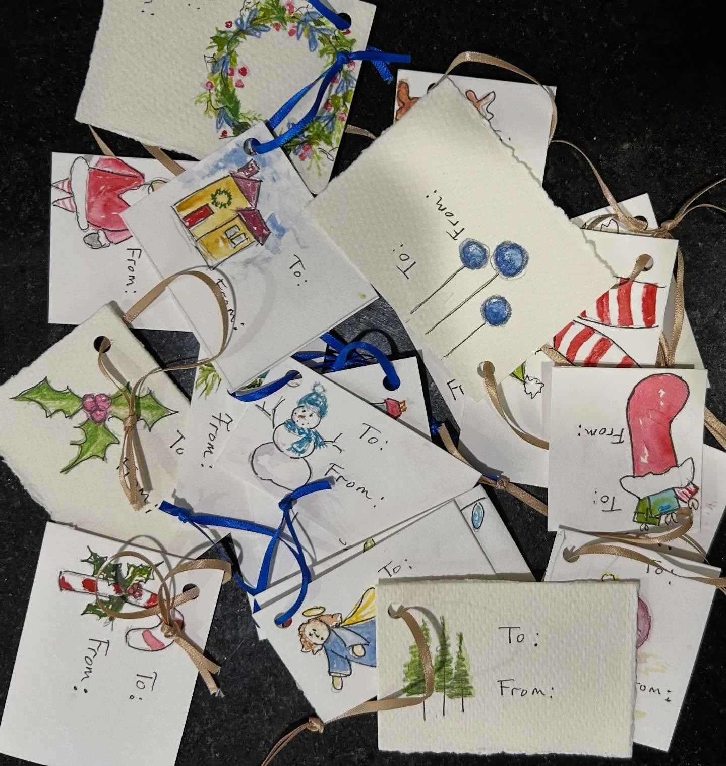 Getting in the spirit.  Using my small bits of watercolor paper this make some gift tags. #christmasgifttag #christmasgifttags #giftsaremylovelanguage #allaboufamily #joyofcreating