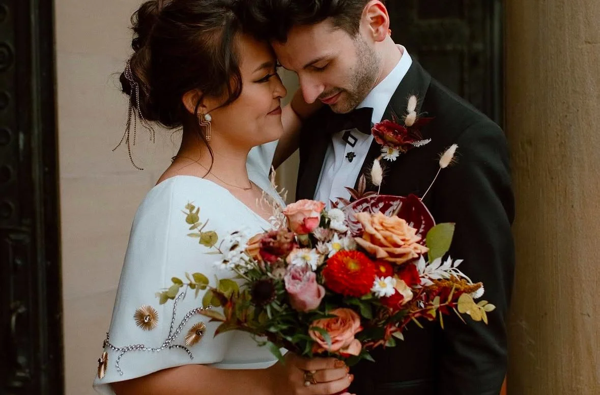 Bride and groom captured in Maryland wedding portrait with glowing skin and soft romantic hairstyle