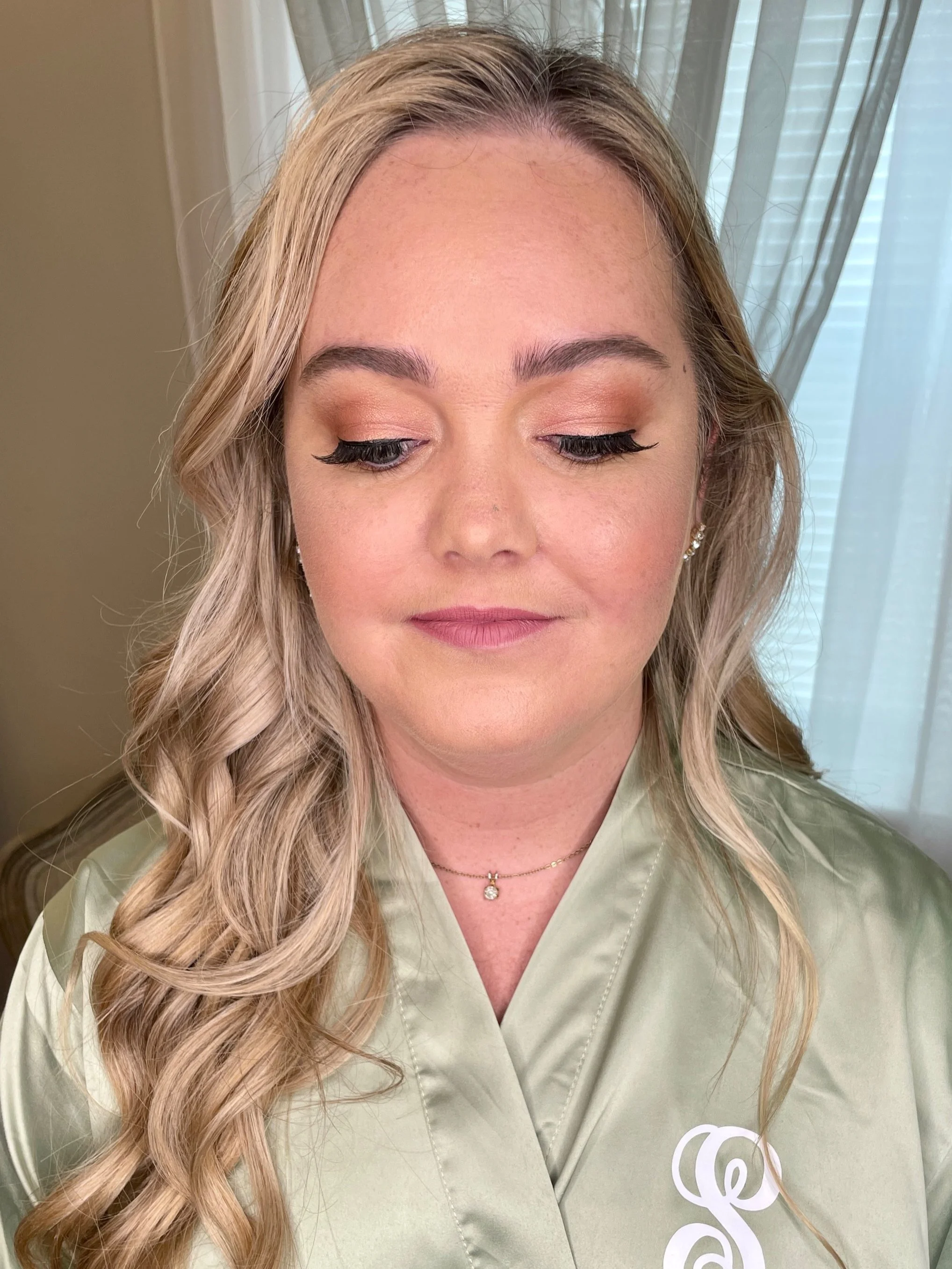 Glowing bridal complexion with soft eye definition in Frederick MD
