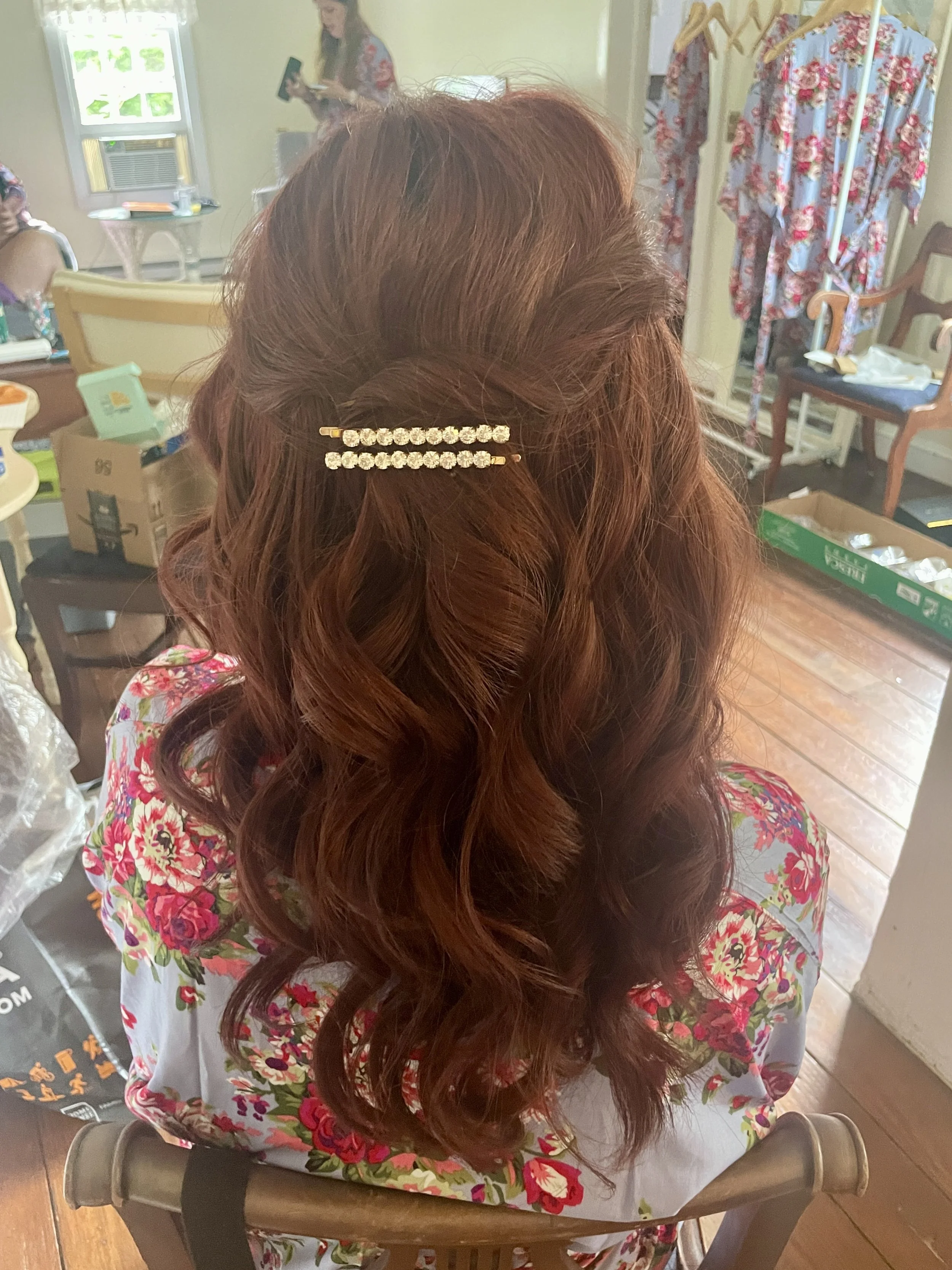 Some up some down bridal hair pinned back with a gold hair pin for medium hair length by Mandy Rollins serving southern PA and Maryland