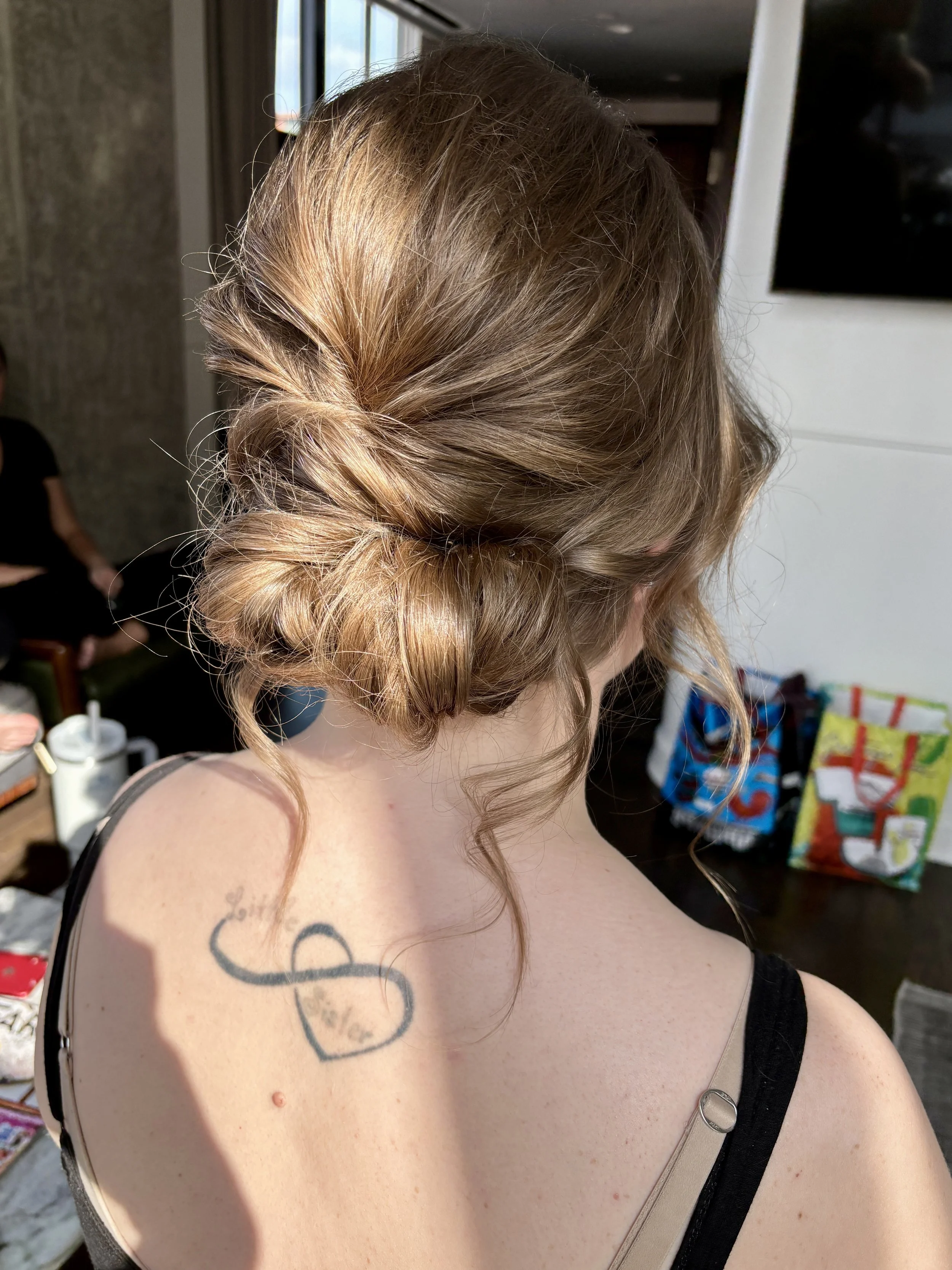 Elegant updo highlighting neckline for countryside Maryland wedding