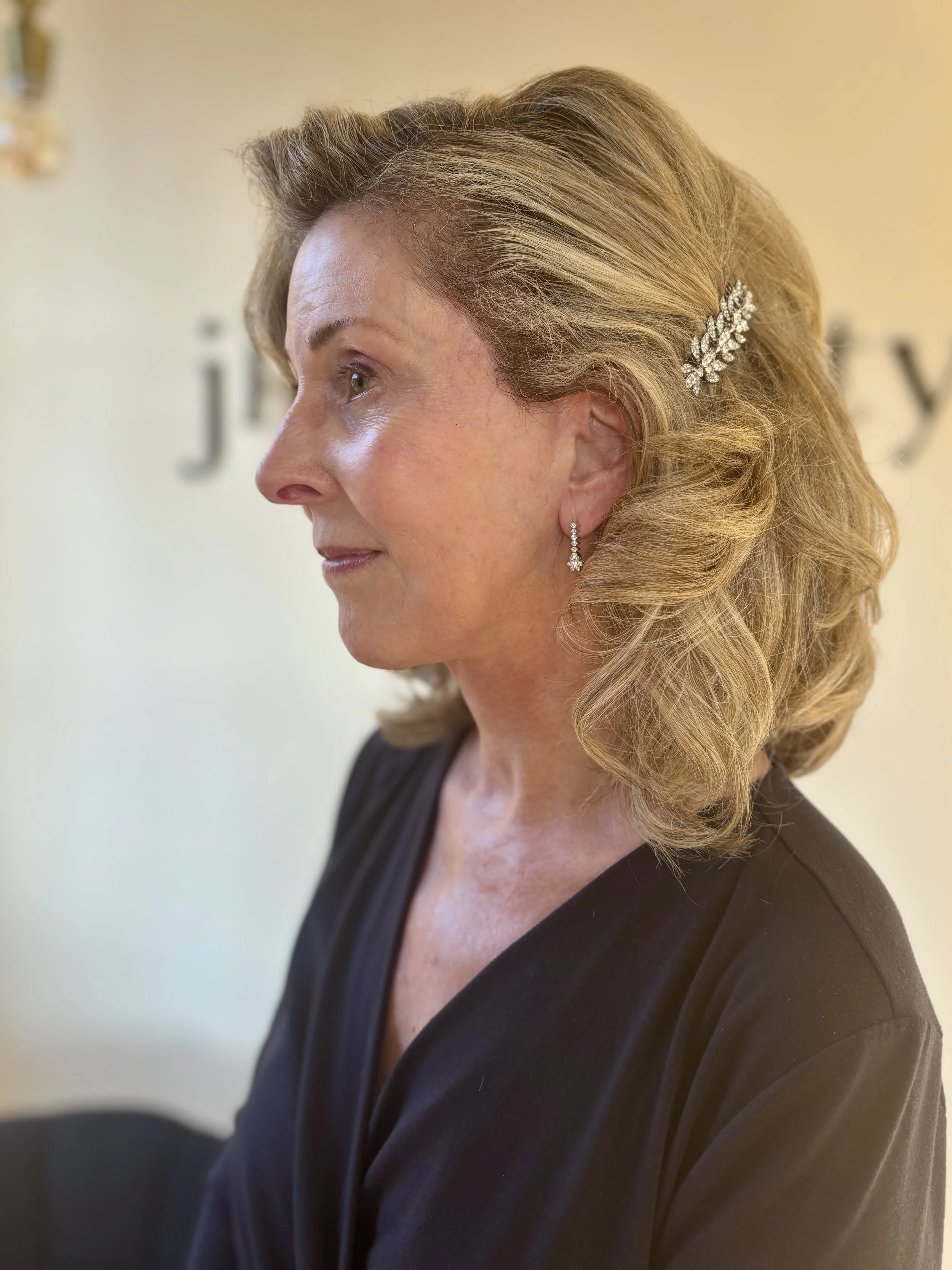 short tousled wedding hair with side hair pin