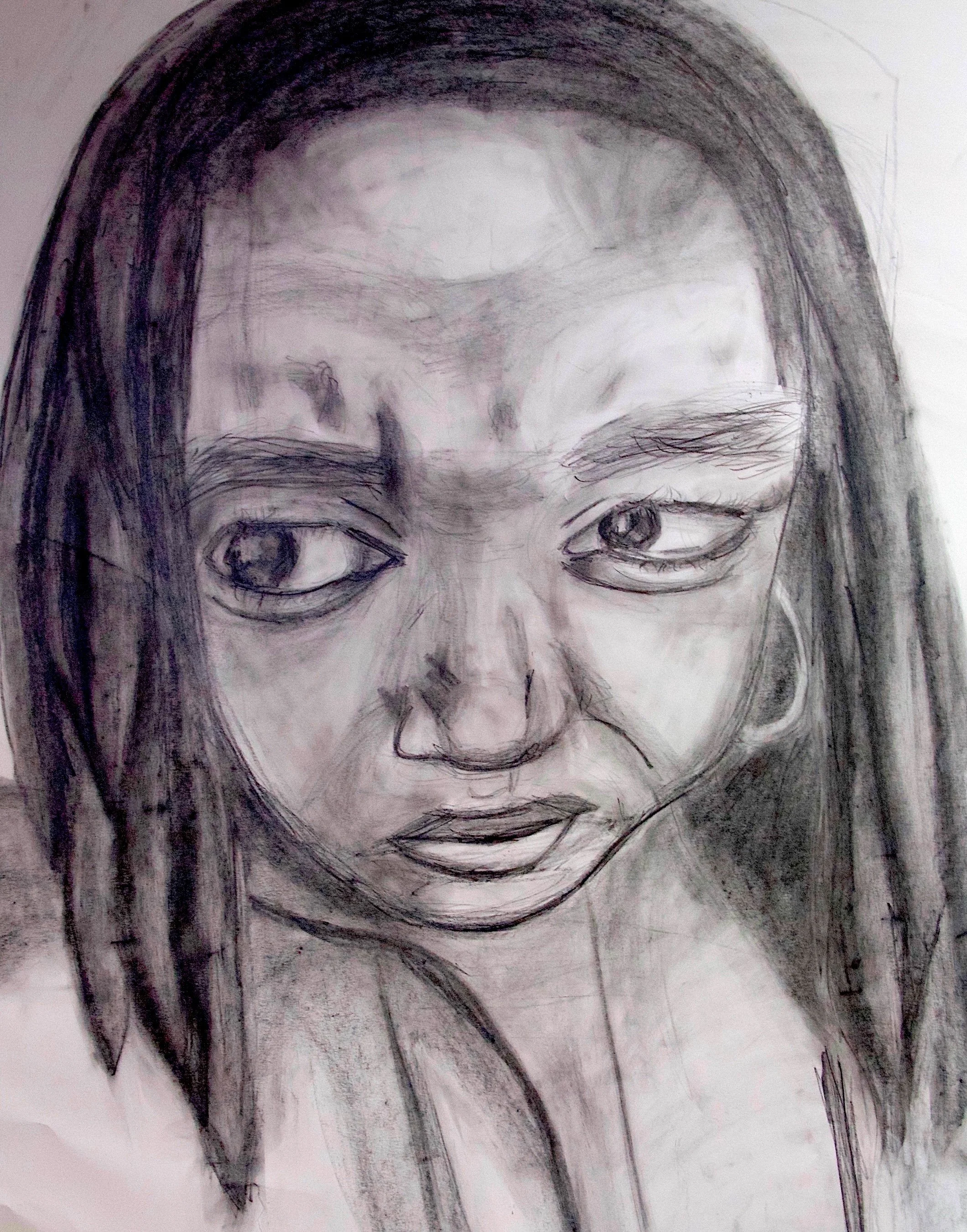 This charcoal portrait exaggerates facial features to convey an intense, almost surreal emotional state. The oversized eyes and expressive shading give the piece a psychological edge, making it more than a traditional study—it becomes a character. Th
