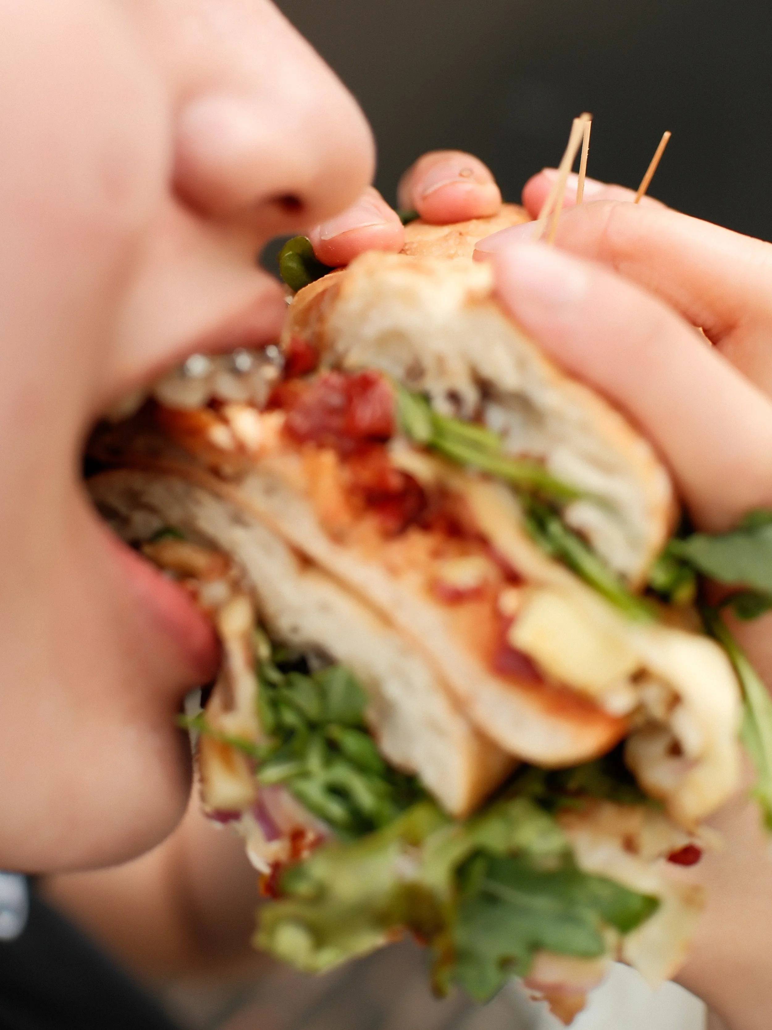 Messy hands, full stomach, can&rsquo;t lose. 🥪✨