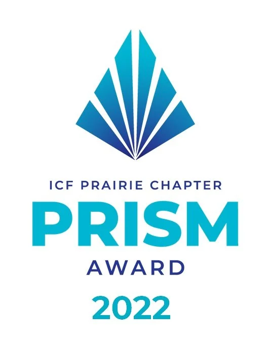 Logo for ICF Prairie Chapter Prism Award 2022 which was awarded to Lorraine Lawrence for excellence in team coaching in Canada, specifically the prairies, with a stylized blue prism graphic and text in blue.