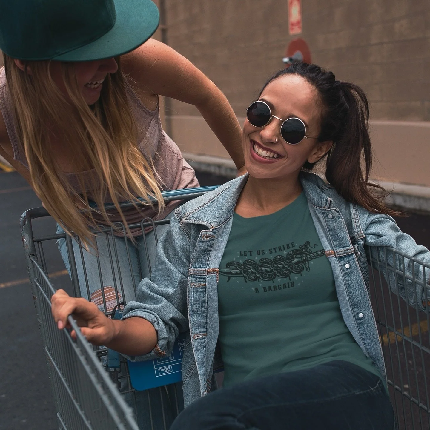 I&rsquo;m reading Child of Shivay (yes, again) to inspire some new designs for the Spring Drop (March 26) and I really just love the part of the book that inspired this tee. ⚔️🐍 

Who would you make a bargain with Bagya to save??

#vudoramarie #chil