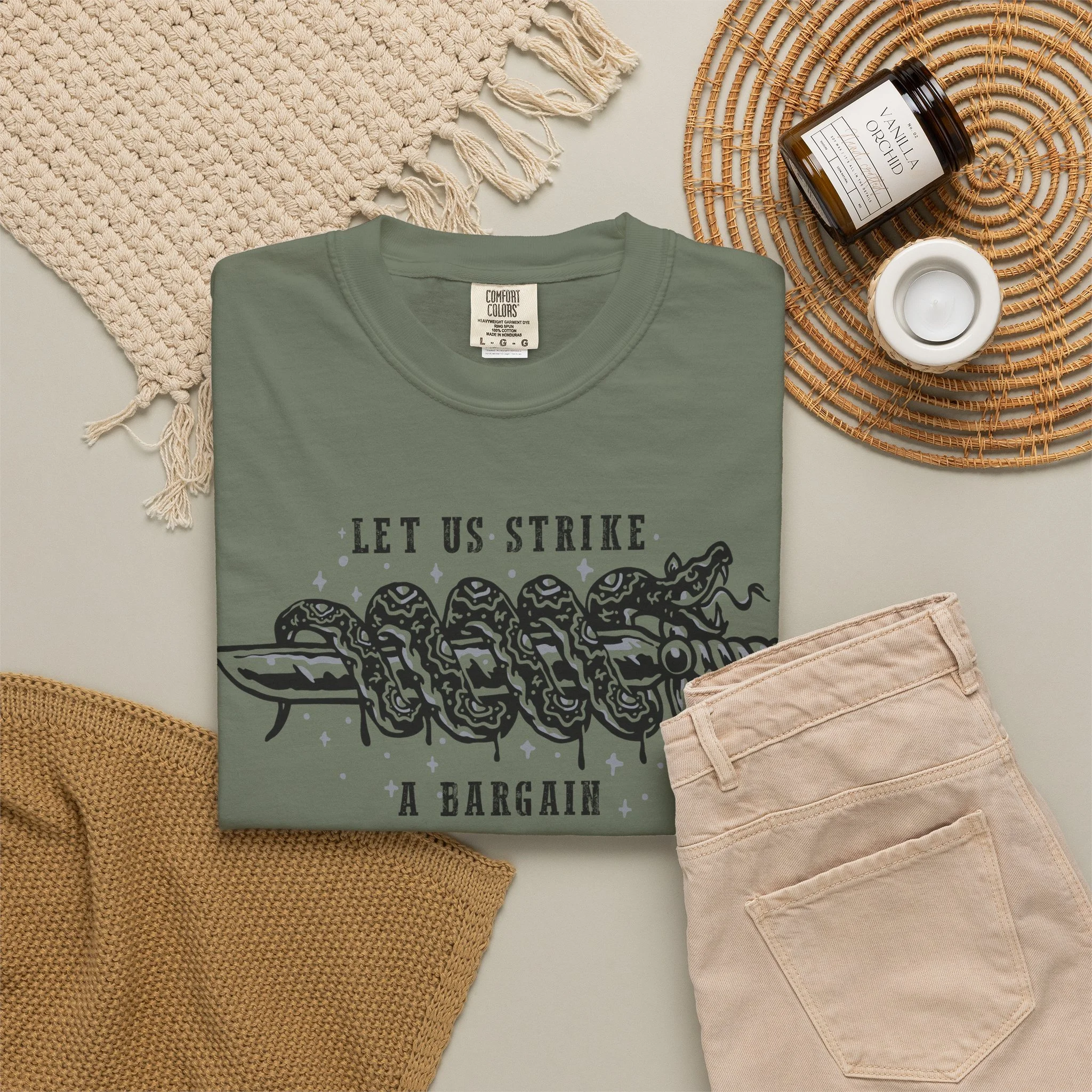 Child of Shivay: Strike a Bargain Tee by Vudora Marie™