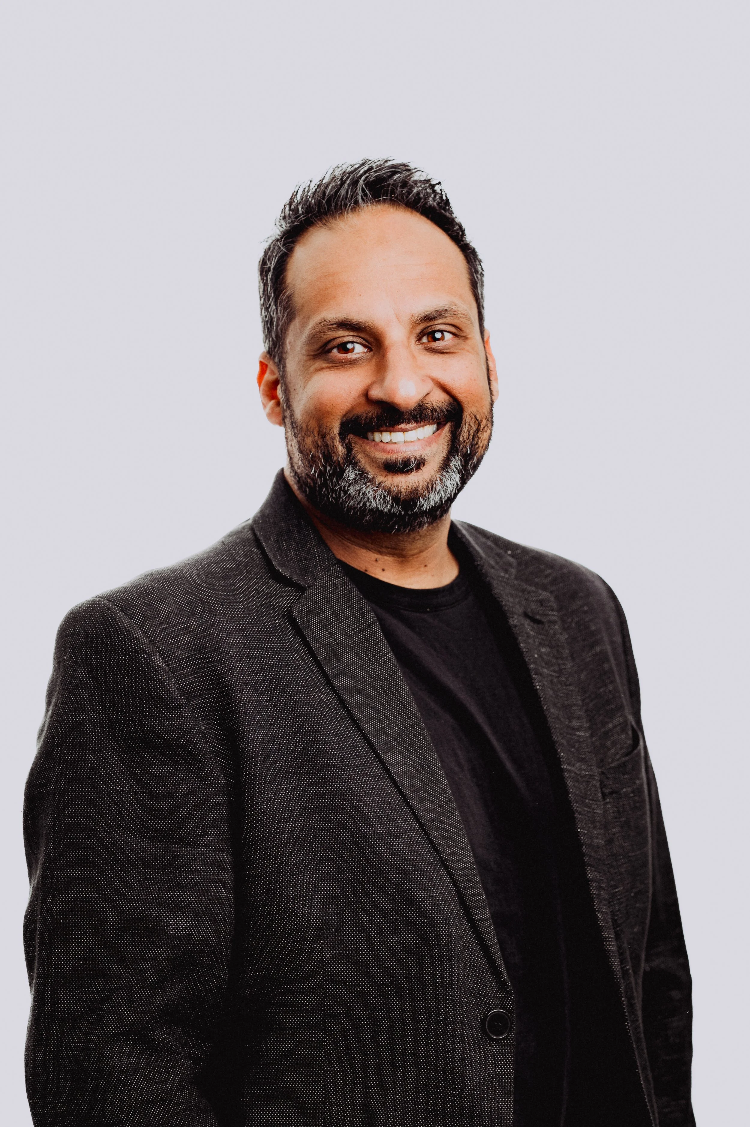 Placeholder silhouette of a person, gray on light gray background.