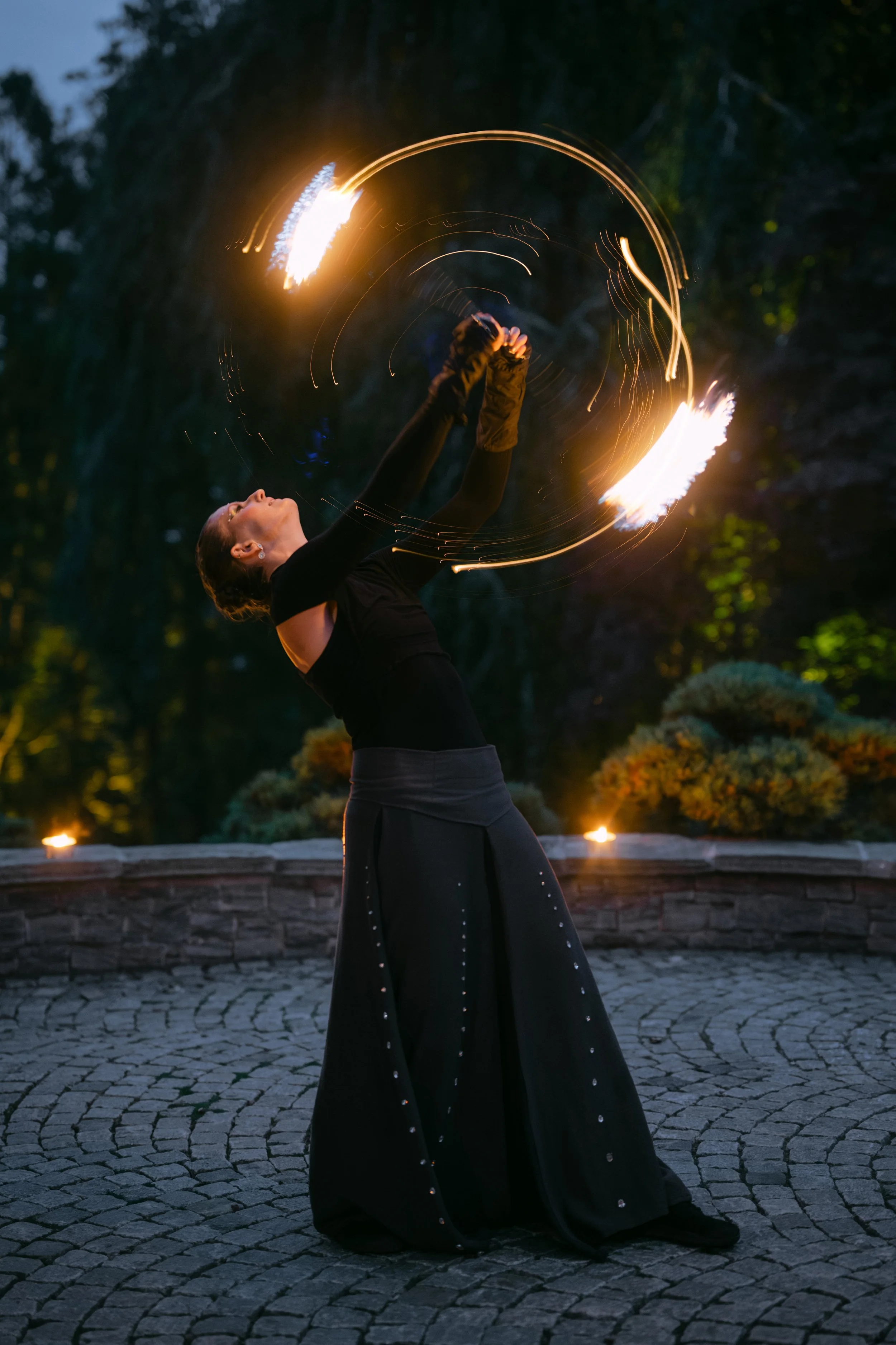 Woman spinning fire