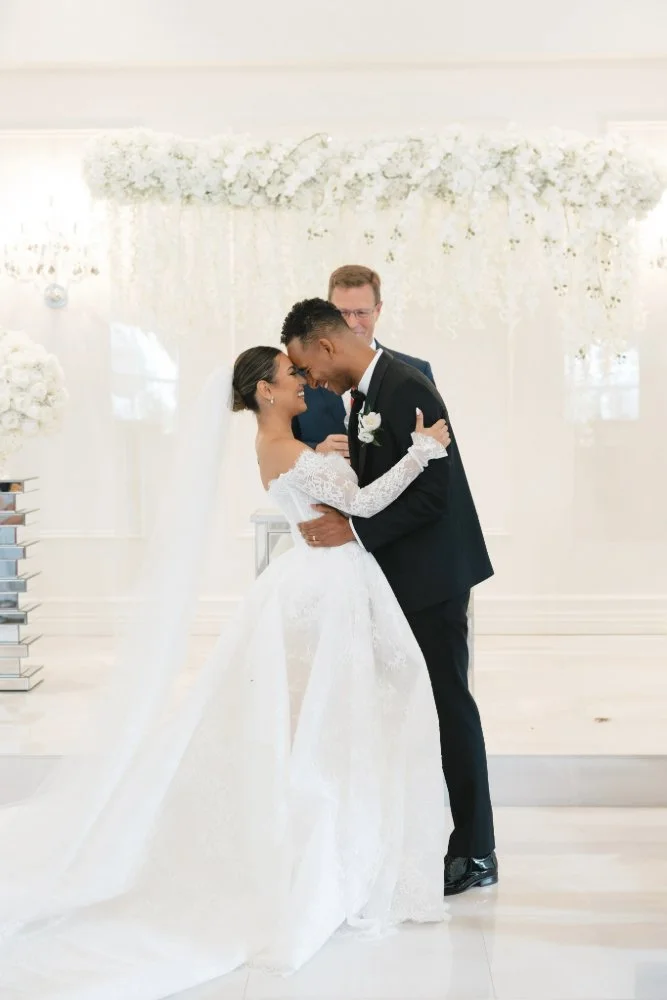 couple hugging in temple wedding ceremony