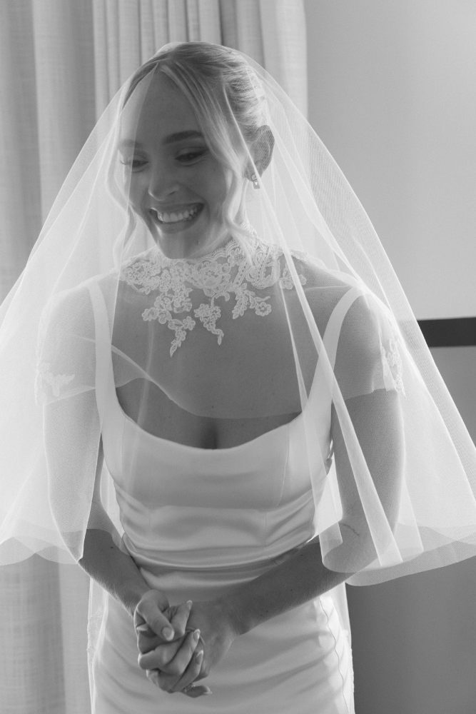 bride smiling in black and white close up photo on wedding day in santa barbara destination wedding