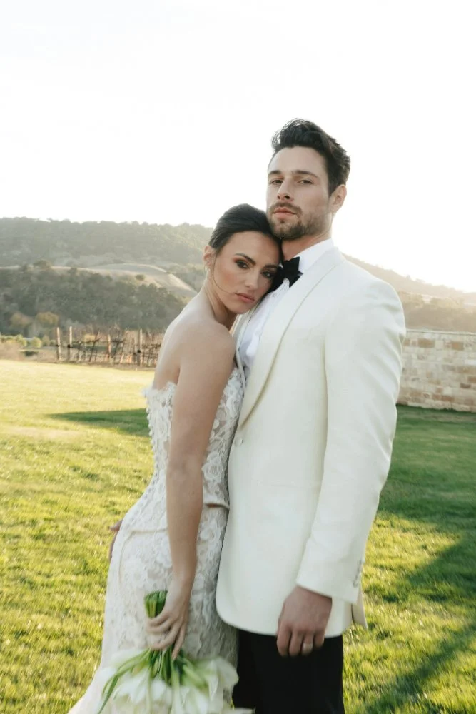 couple hugging in sunstone villa styled wedding photo shoot