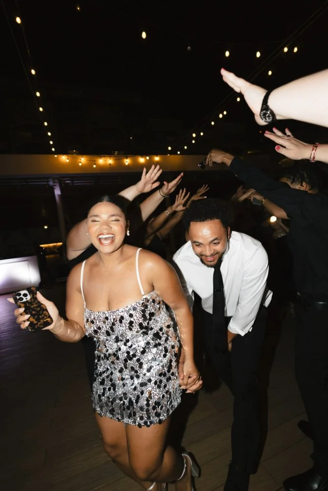couple laughing at cancun wedding reception